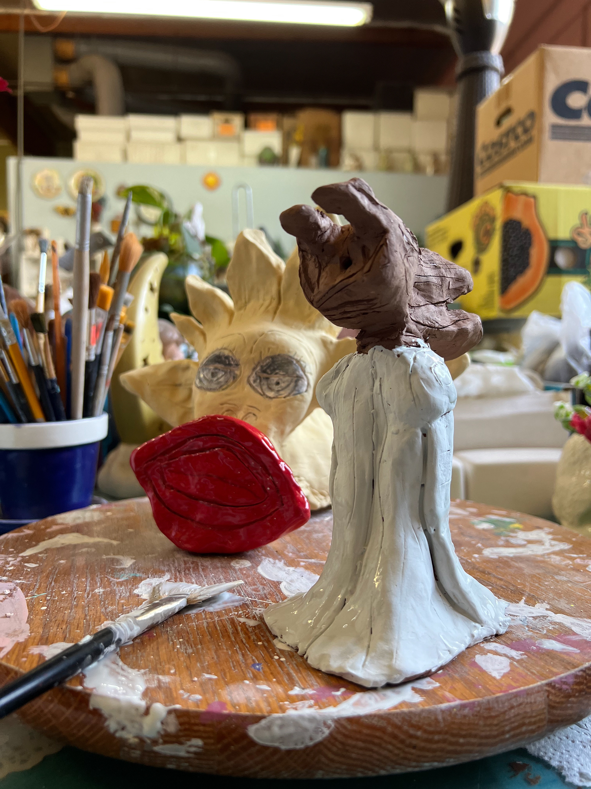 Pammy ceramic head and Perro en Bata.