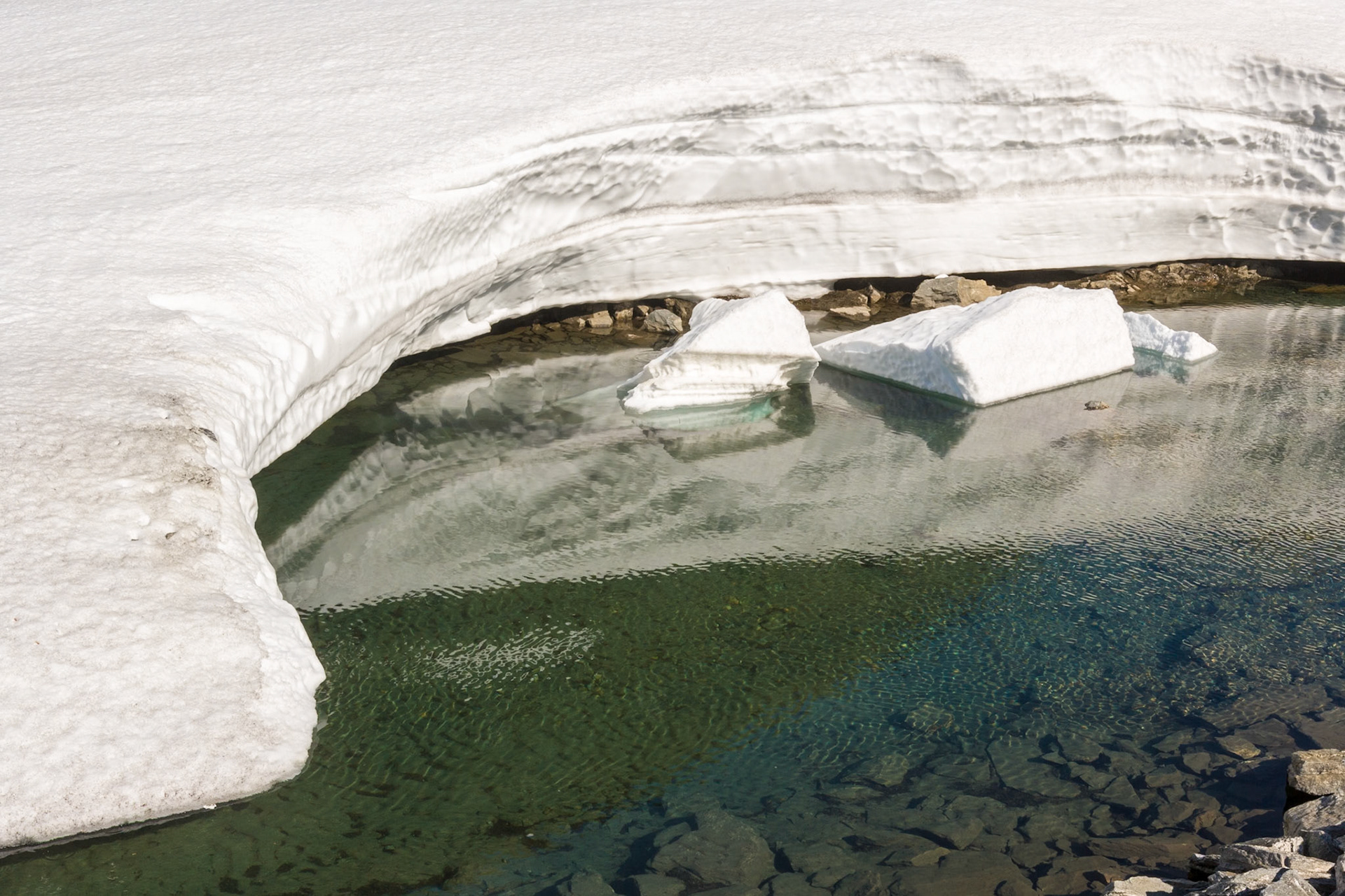 Snow near River at route 63 Geiranger-Stryn