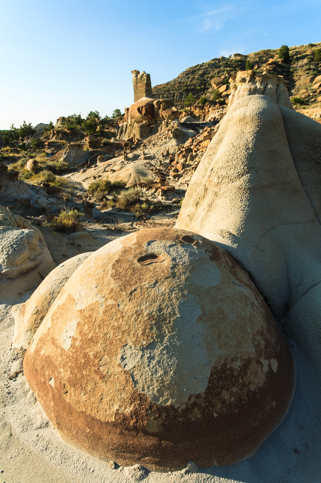 Erosion at Makoshika State Park at sunset, Montana, North America, USA