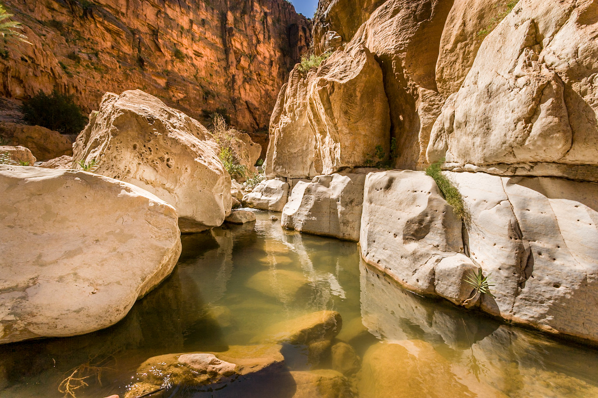 River between rocks at Valley at Amtoudi Id Aïsa, Morocco