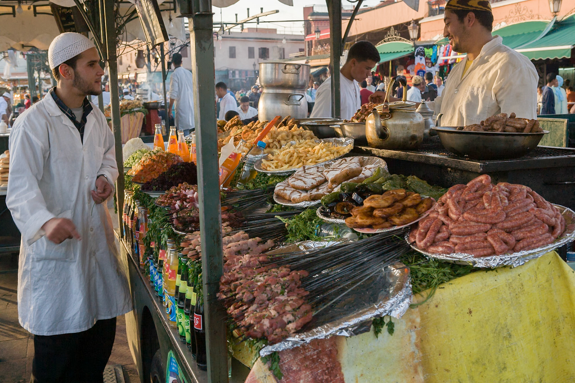 Men working at open restaurant at Place Djamaa el Fna at the city of  Marrakech