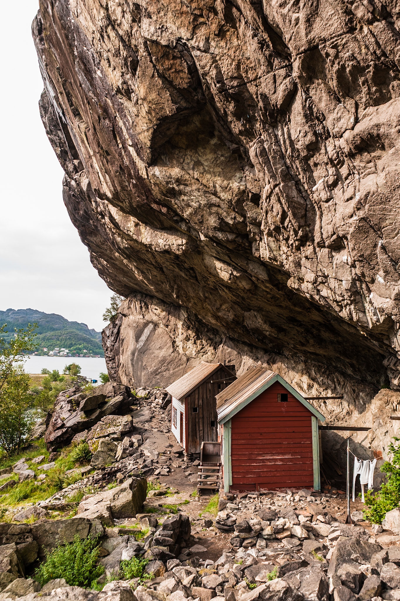 Overhanging cliff, called 'Helleren', near to the village Helleren at the Jøsingfjord at the 44. Ancient houses.