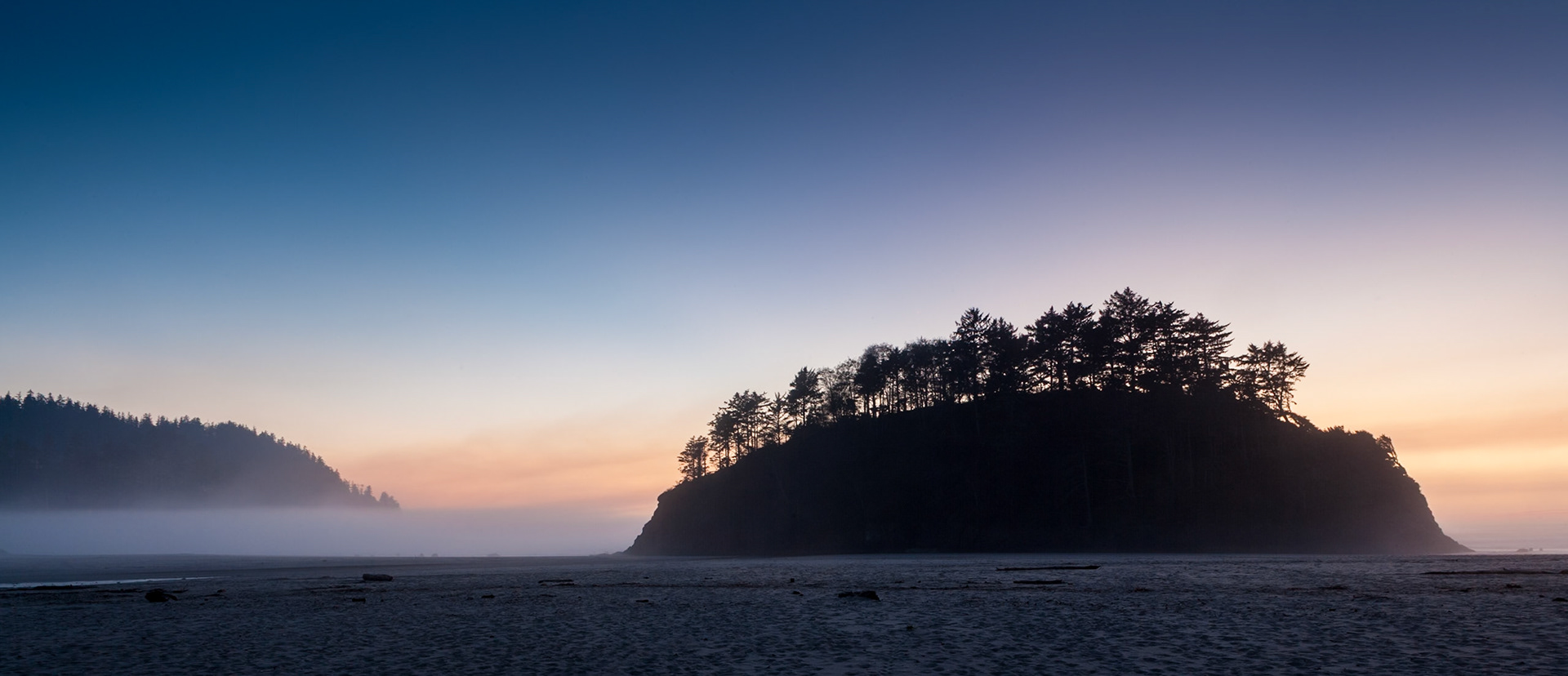 Sunset at Proposal Rock at South Beach at Neskowin, OR, USA