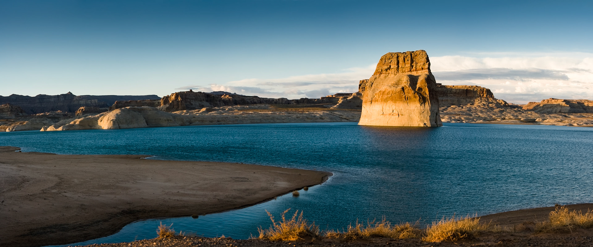 Sunset at Lone Rock at Glen Canyon Recreation area near Page Arzona, USA