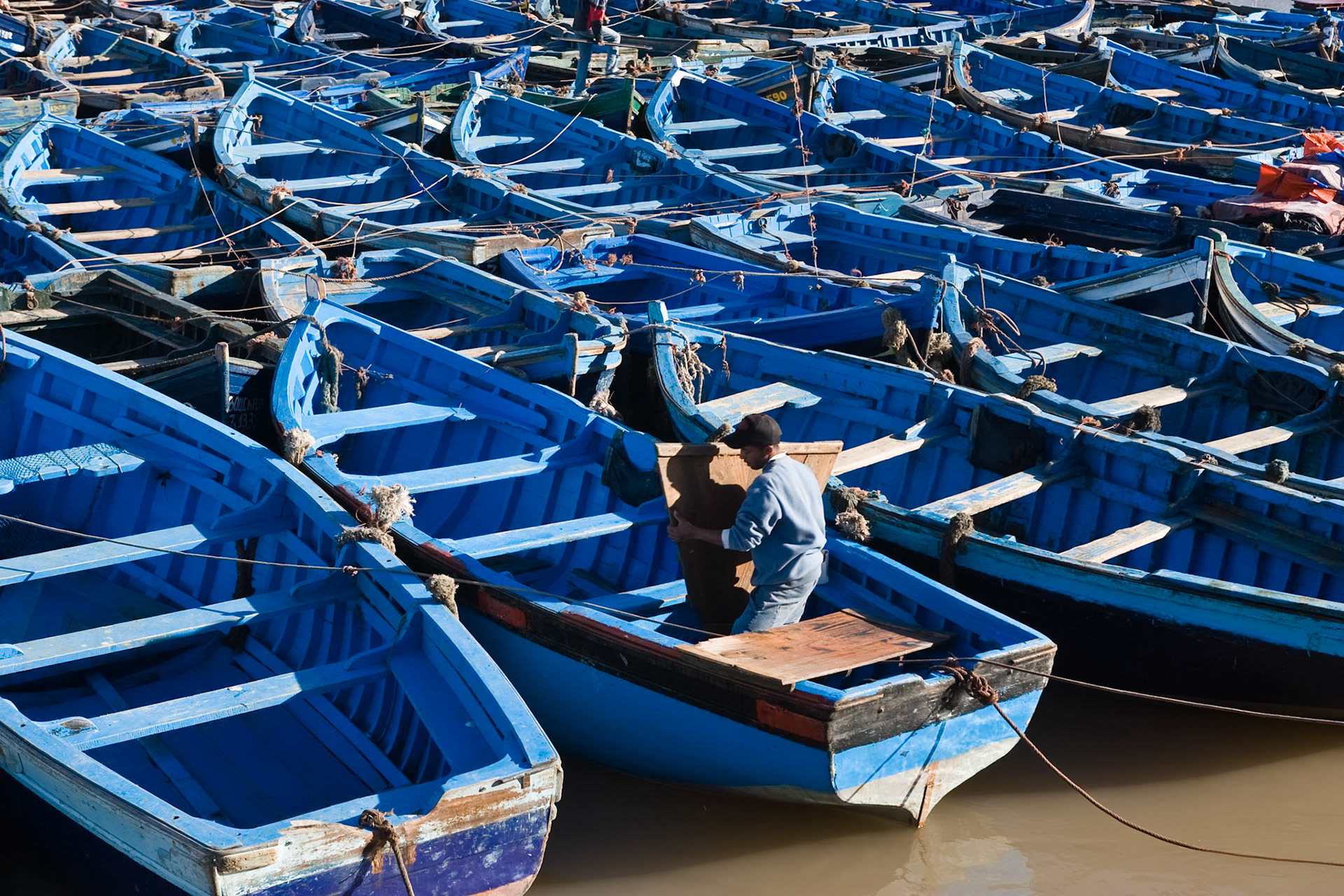 Small blue boats at harbour of Essaouira
