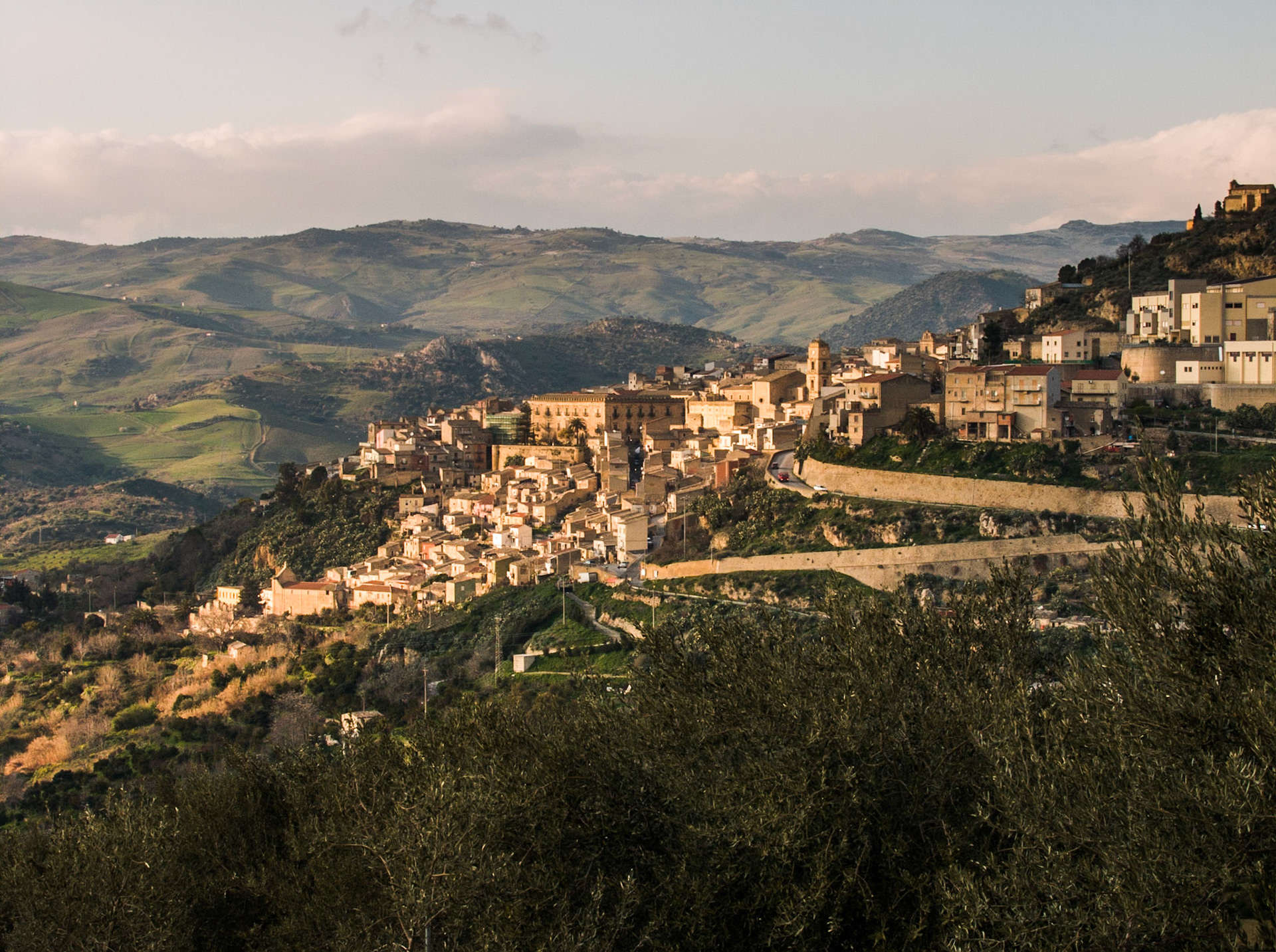 City of Leonforte at sunset in the mountains of Sicily at the S121, Italy