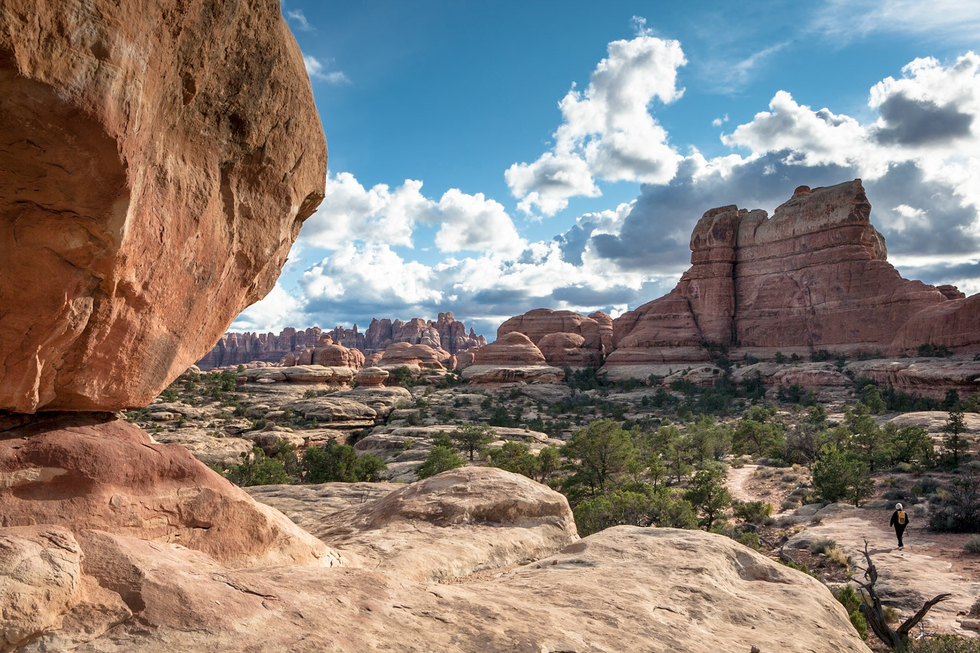 woman hiking at Elephant Hill at CanyonLands NP, UT, USA