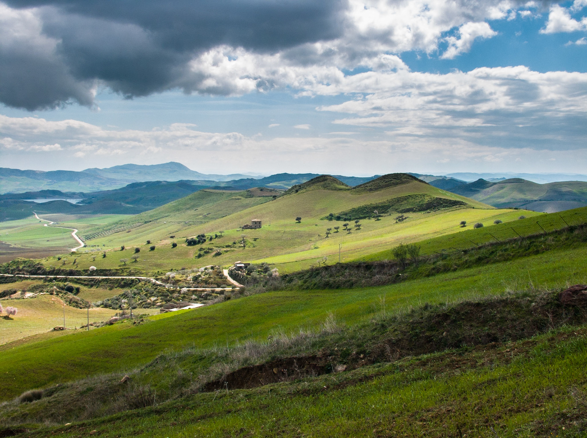 Green hills Landscape at Agira in the province of Enna at the S121, Sicily, Italy