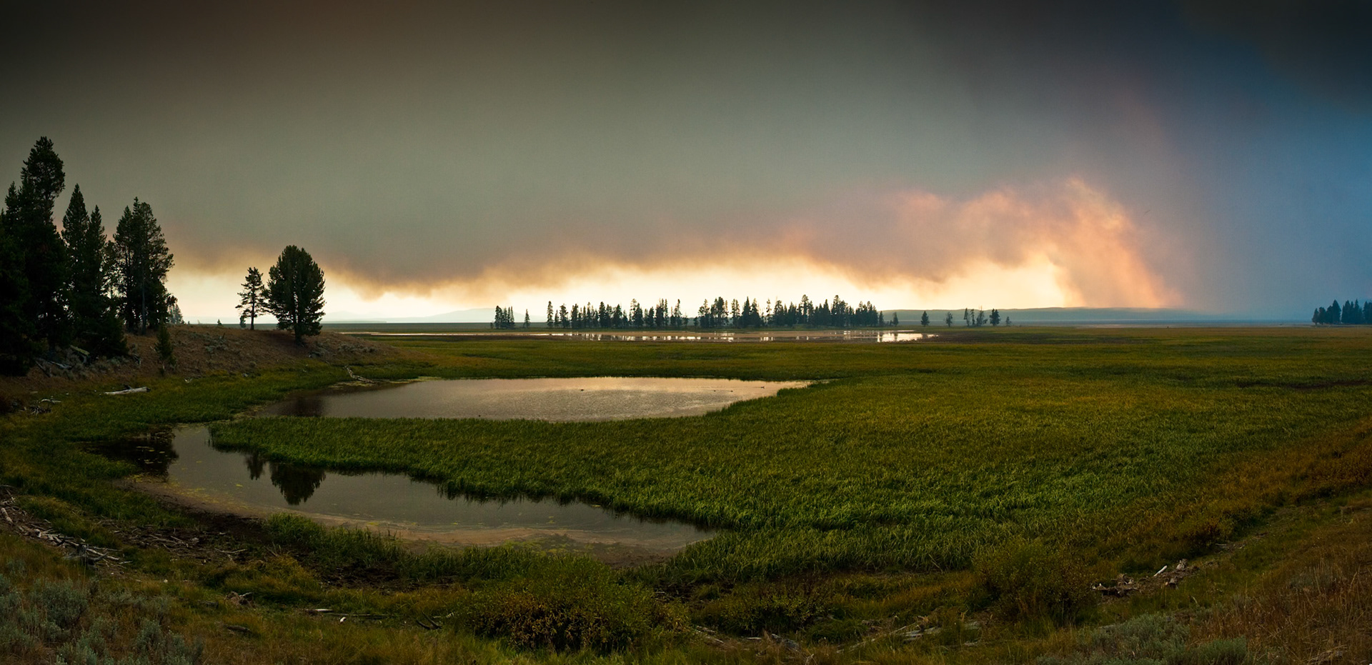 Forest Fire Smoke at the horizon of Hayden Valley Yellowstone National Park, WY, USA