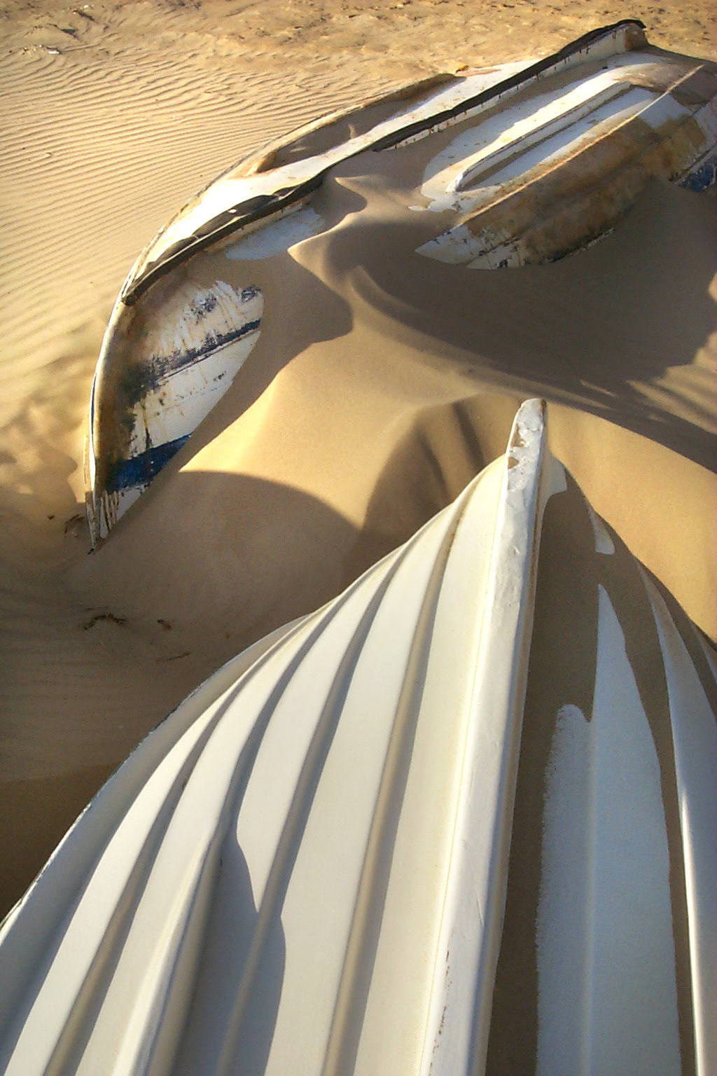 Boats in sand on the beach