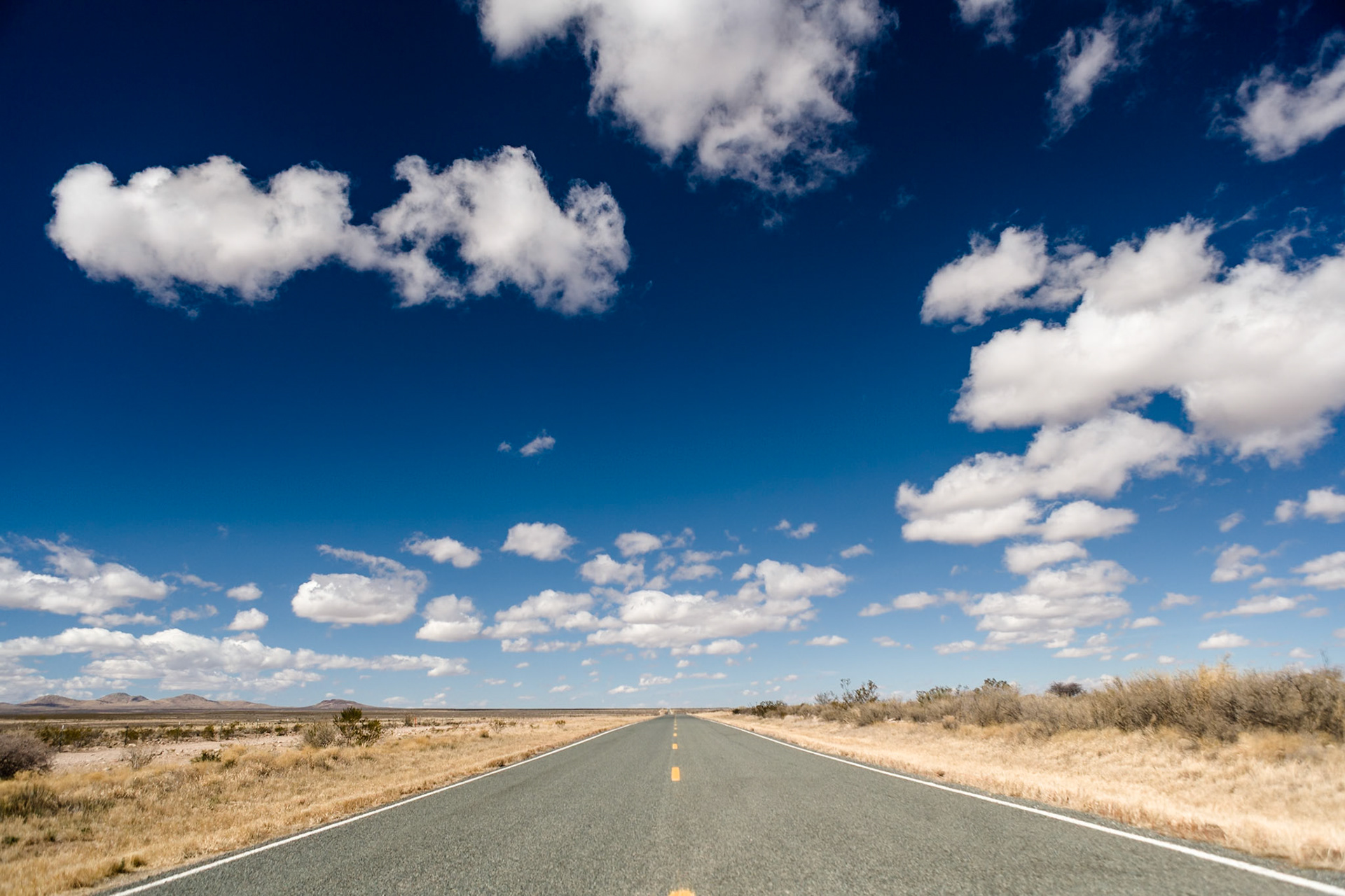 Road with Clouds in the sky in Arizona, USA