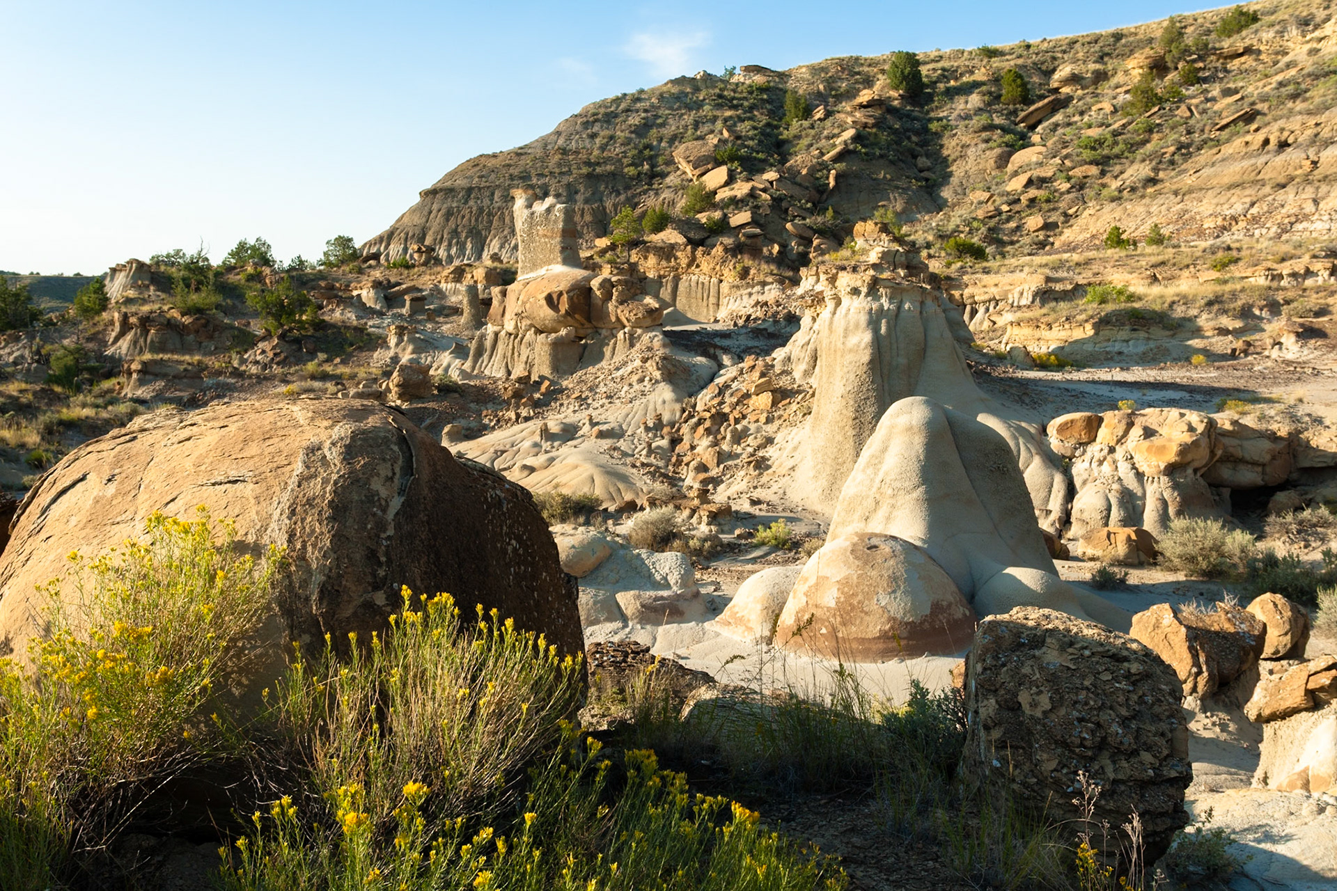 Erosion at Makoshika State Park at sunset, Montana, North America, USA