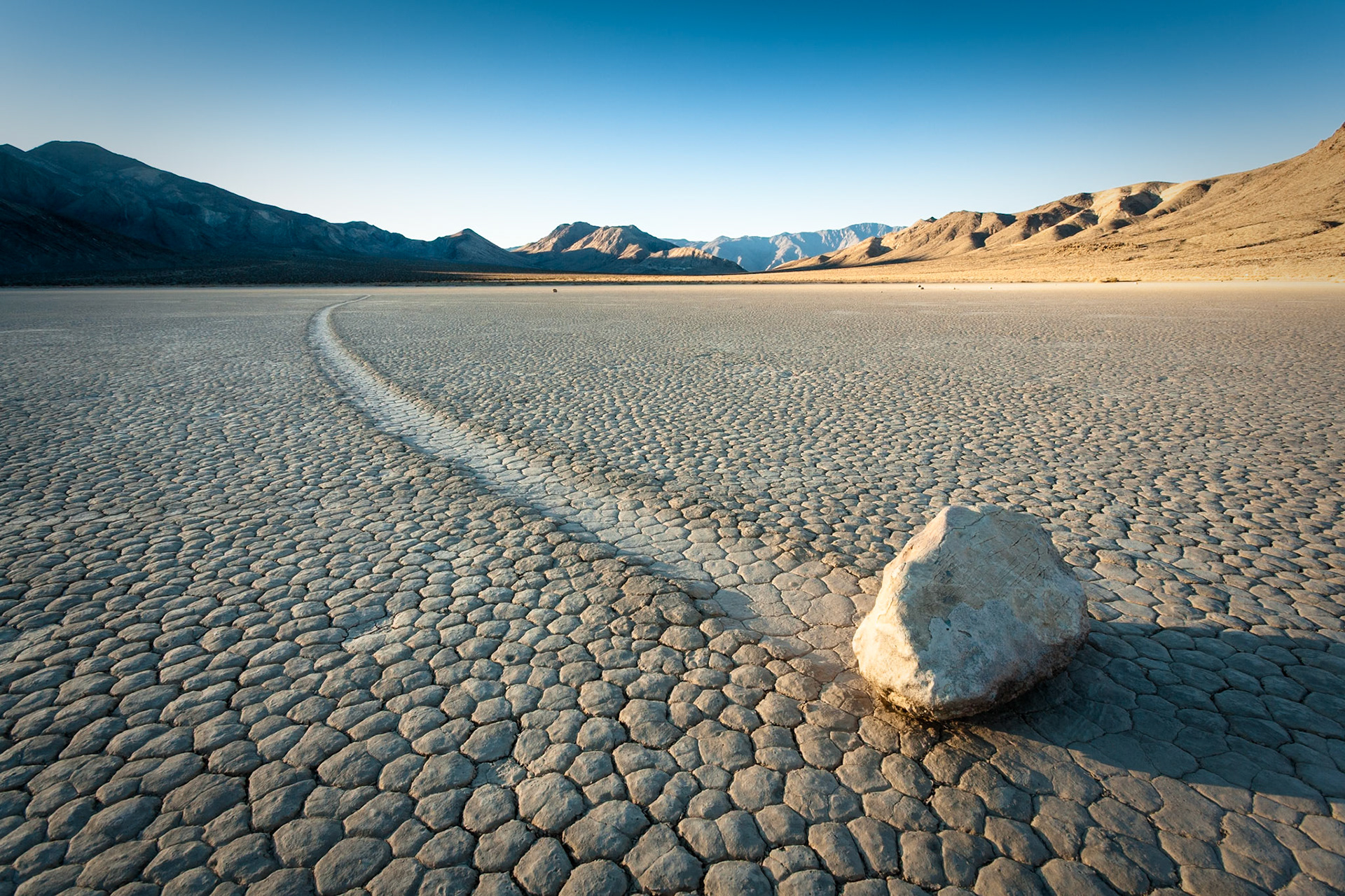 Rock on the racetrack in Death Valley at sunrise, CA, USA