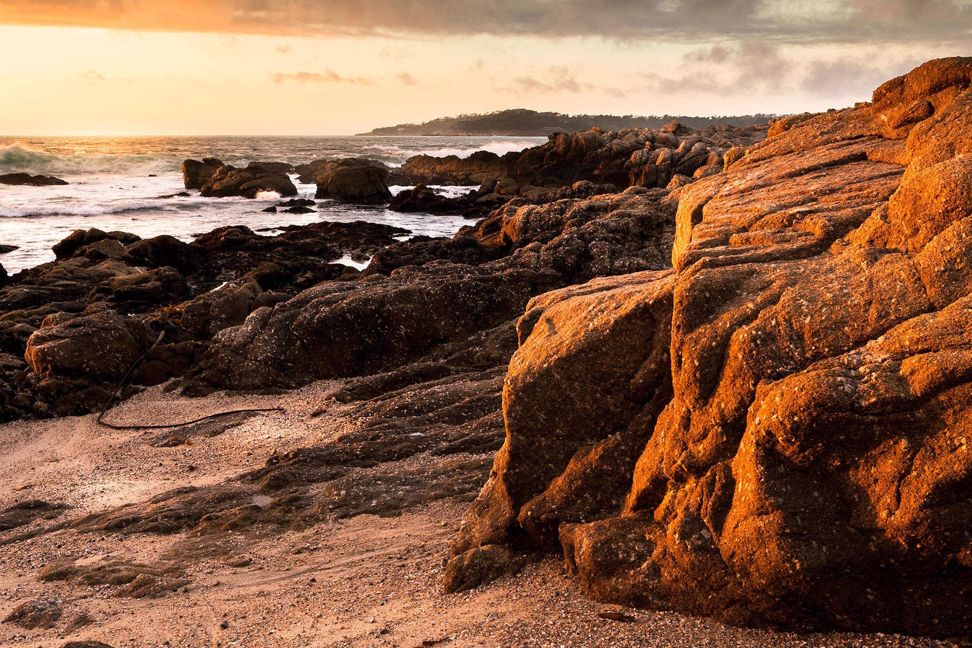 Beach of Carmel at sunset, California, USA