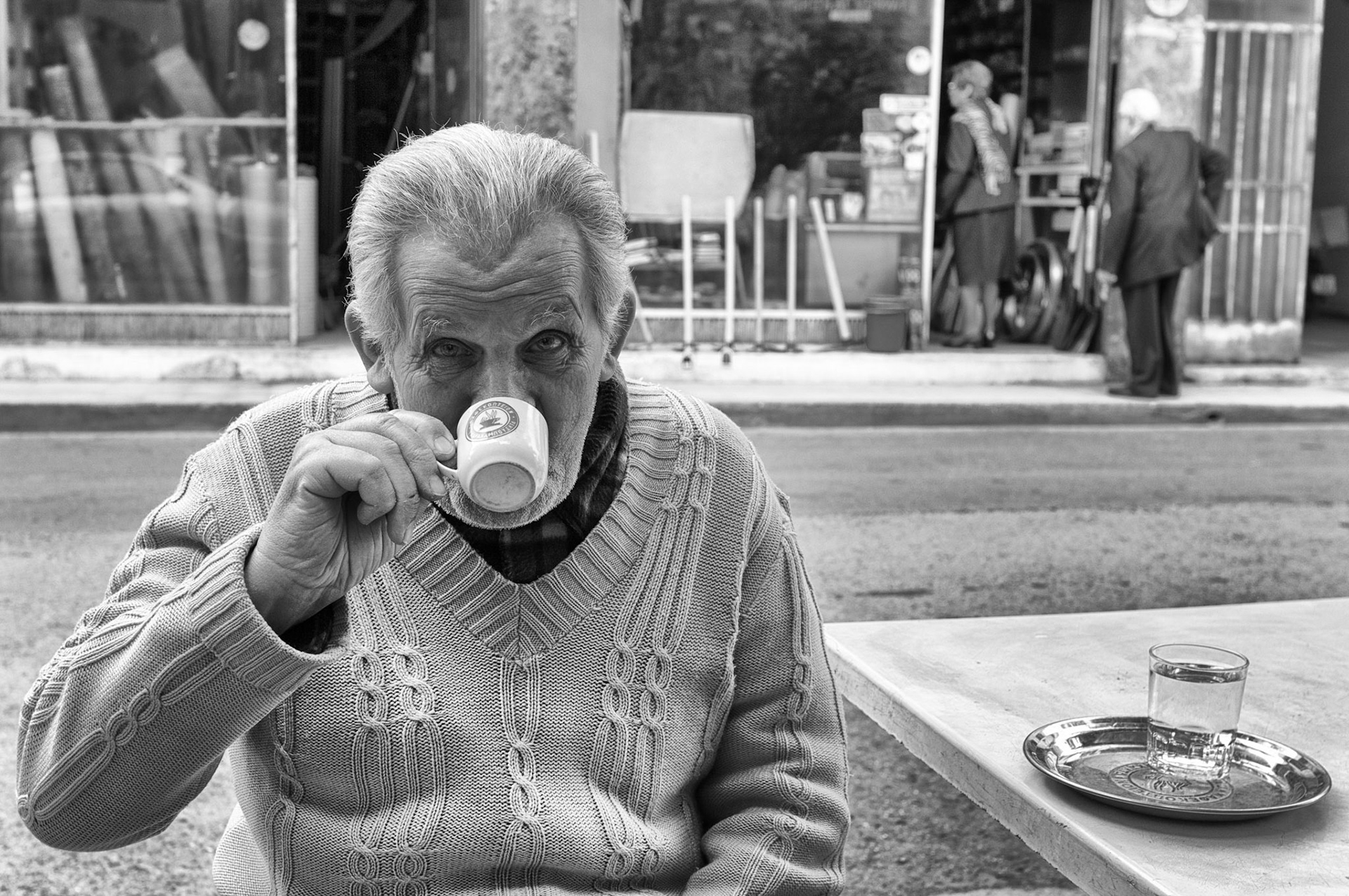 Old man enjoying his Cyprus coffee at a small coffee shop in Old Nicosia, Cyprus