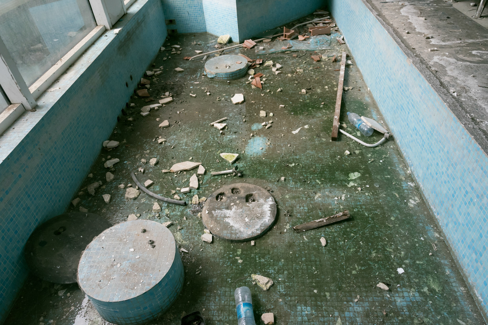 A dried pool at the lobby of the abandoned hotel in Nicosia, Cyprus