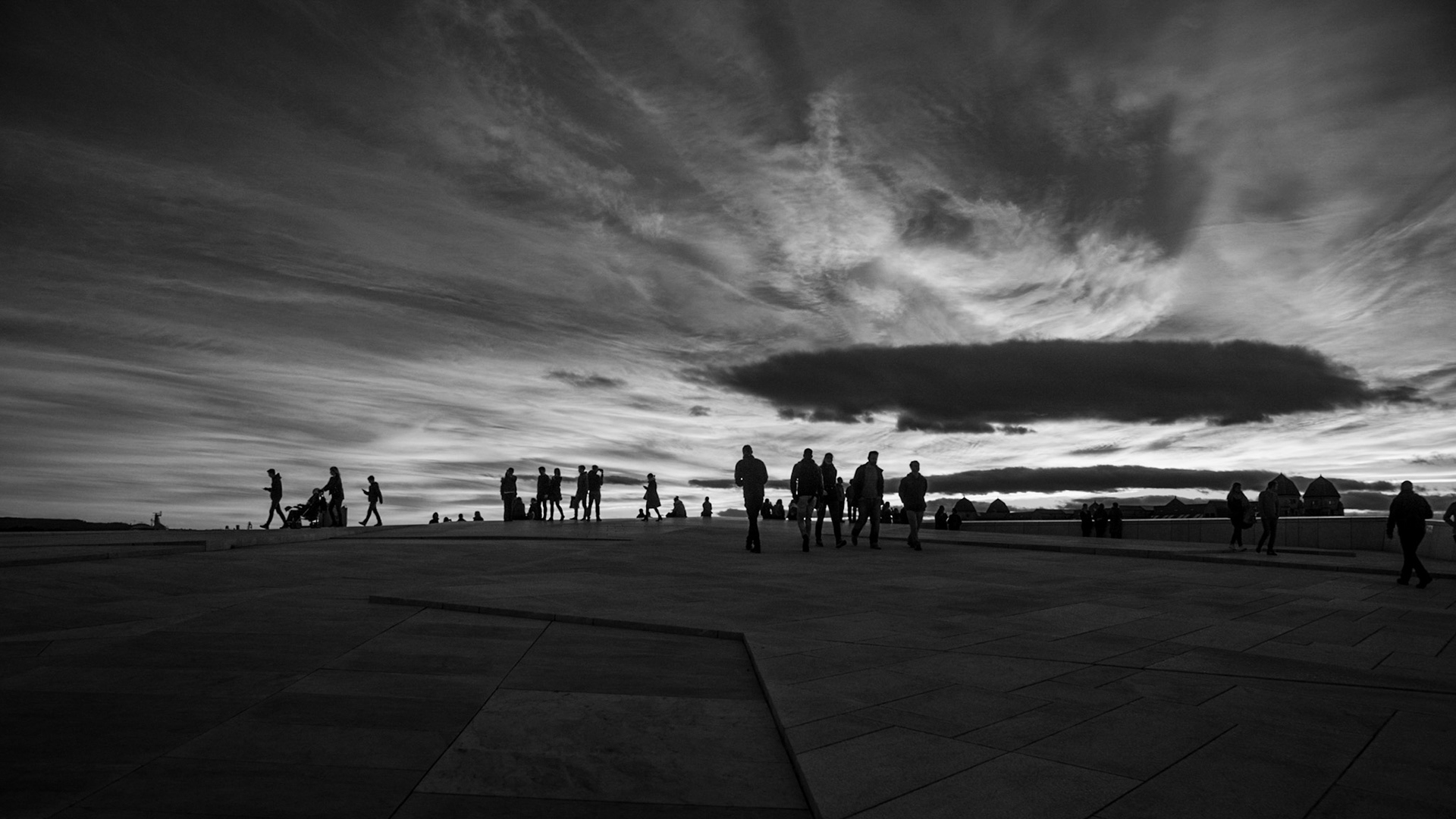 People walking on the roof of the Oslo Opera House in Norway