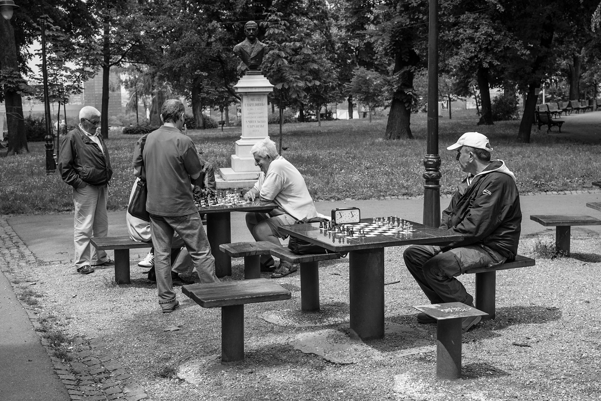 Old men playing chess in the park in Belgrade, Serbia