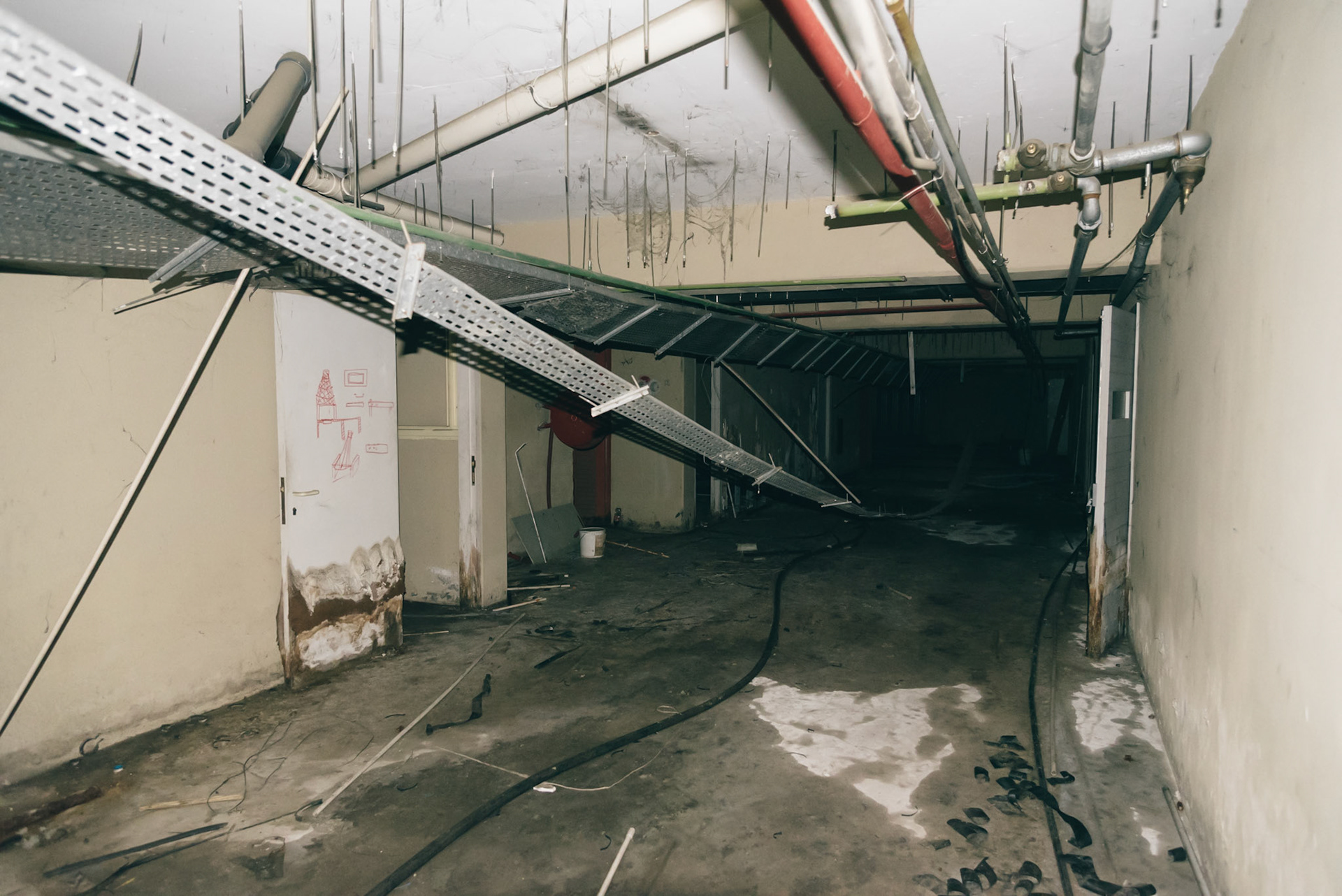 A corridor in the basement of the abandoned hotel