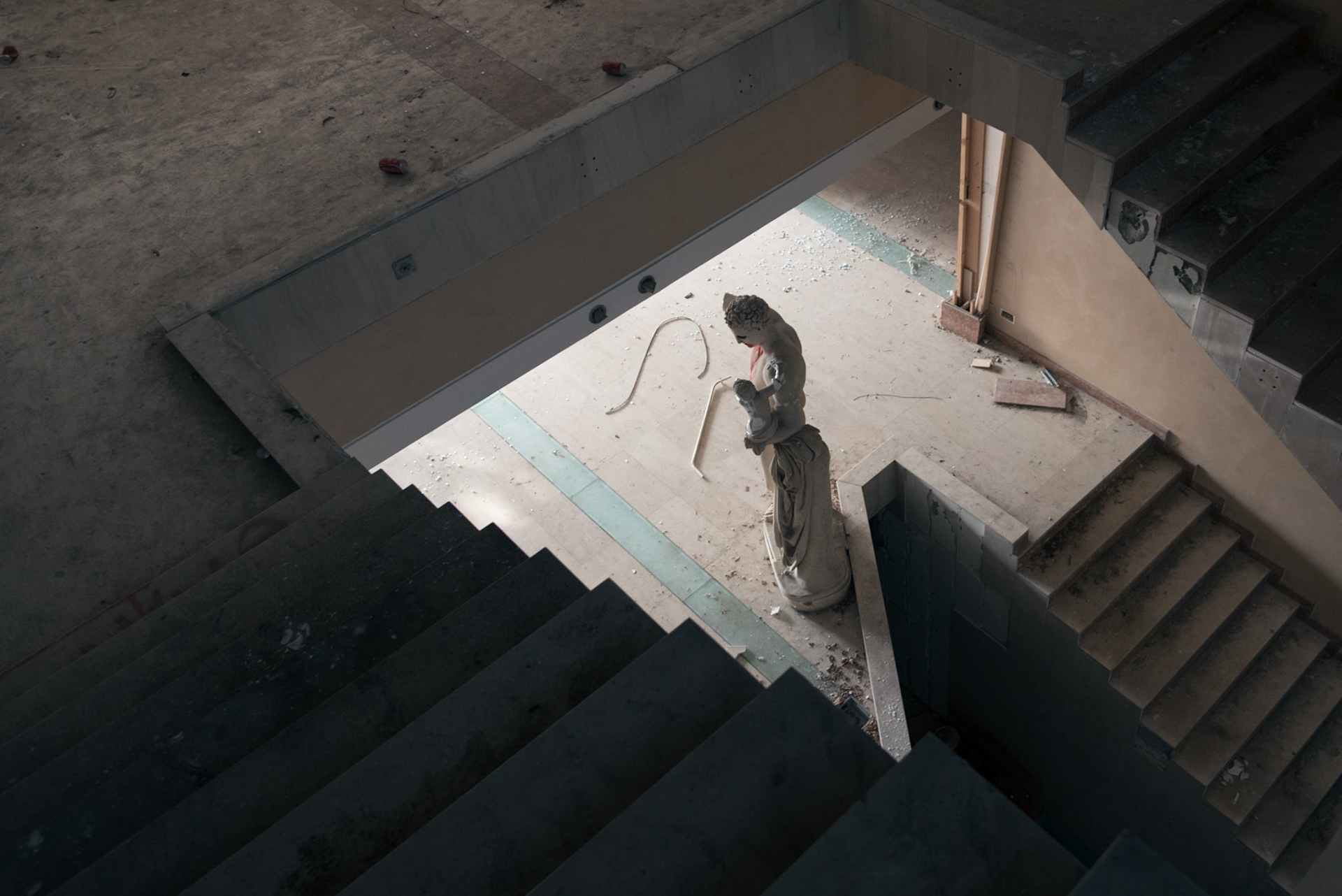 A defaced replica statue of the  Hermes of Praxiteles found in the first floor of the abandoned hotel