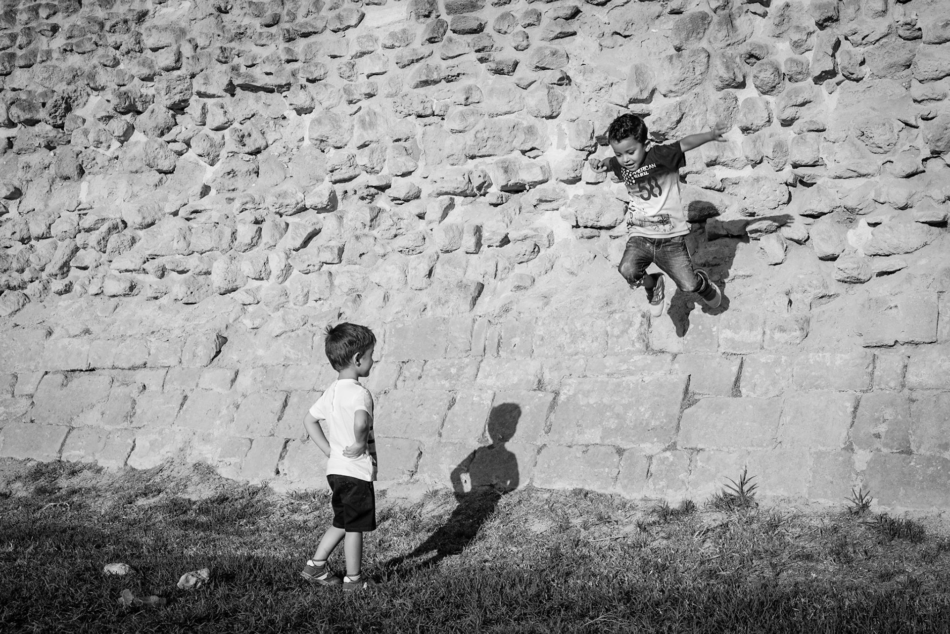 Little kids playing next to the Venetian Walsl of Nicosia, Cyprus