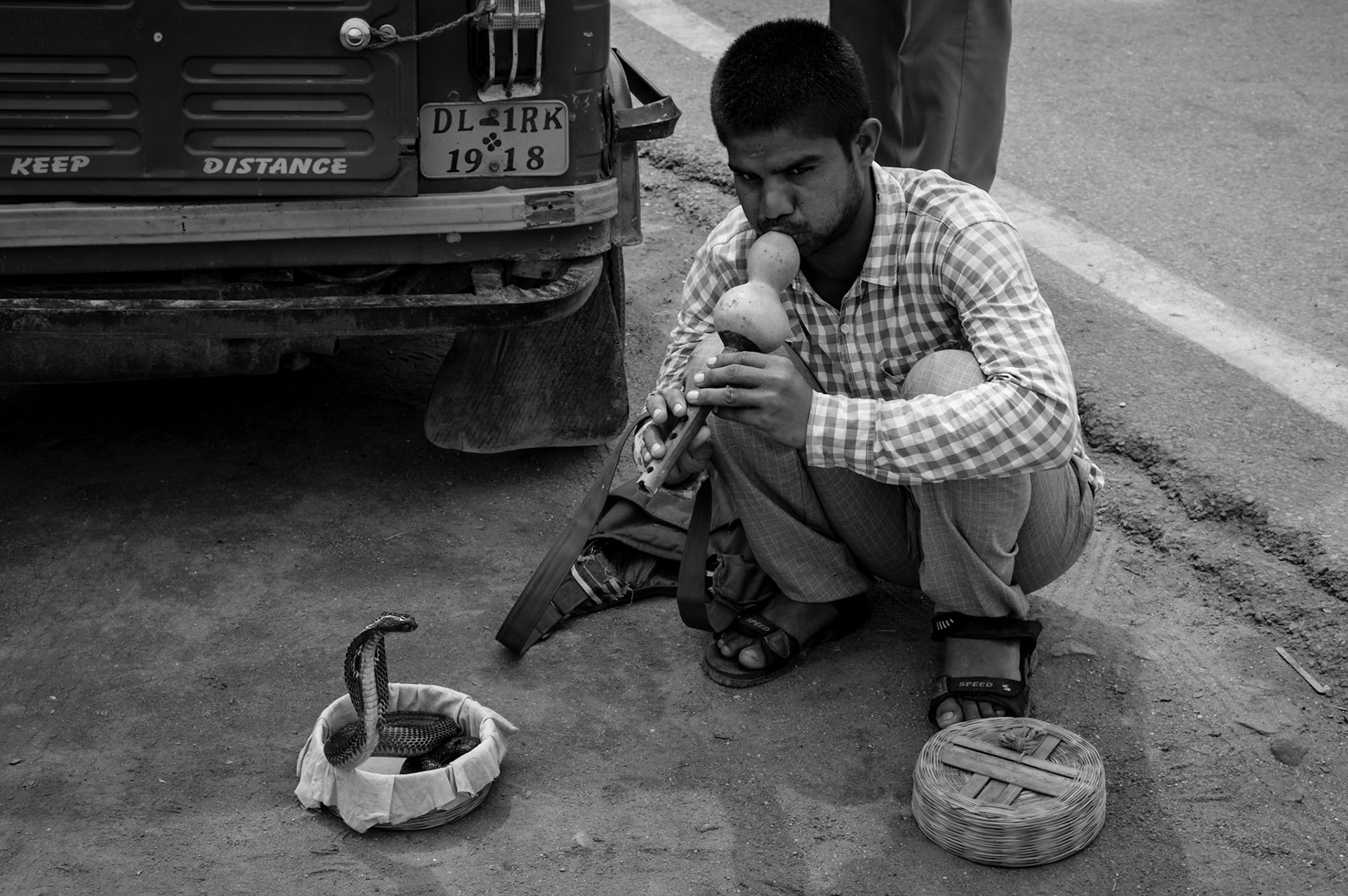 Snake Charmer near India Gate in New Delhi, India