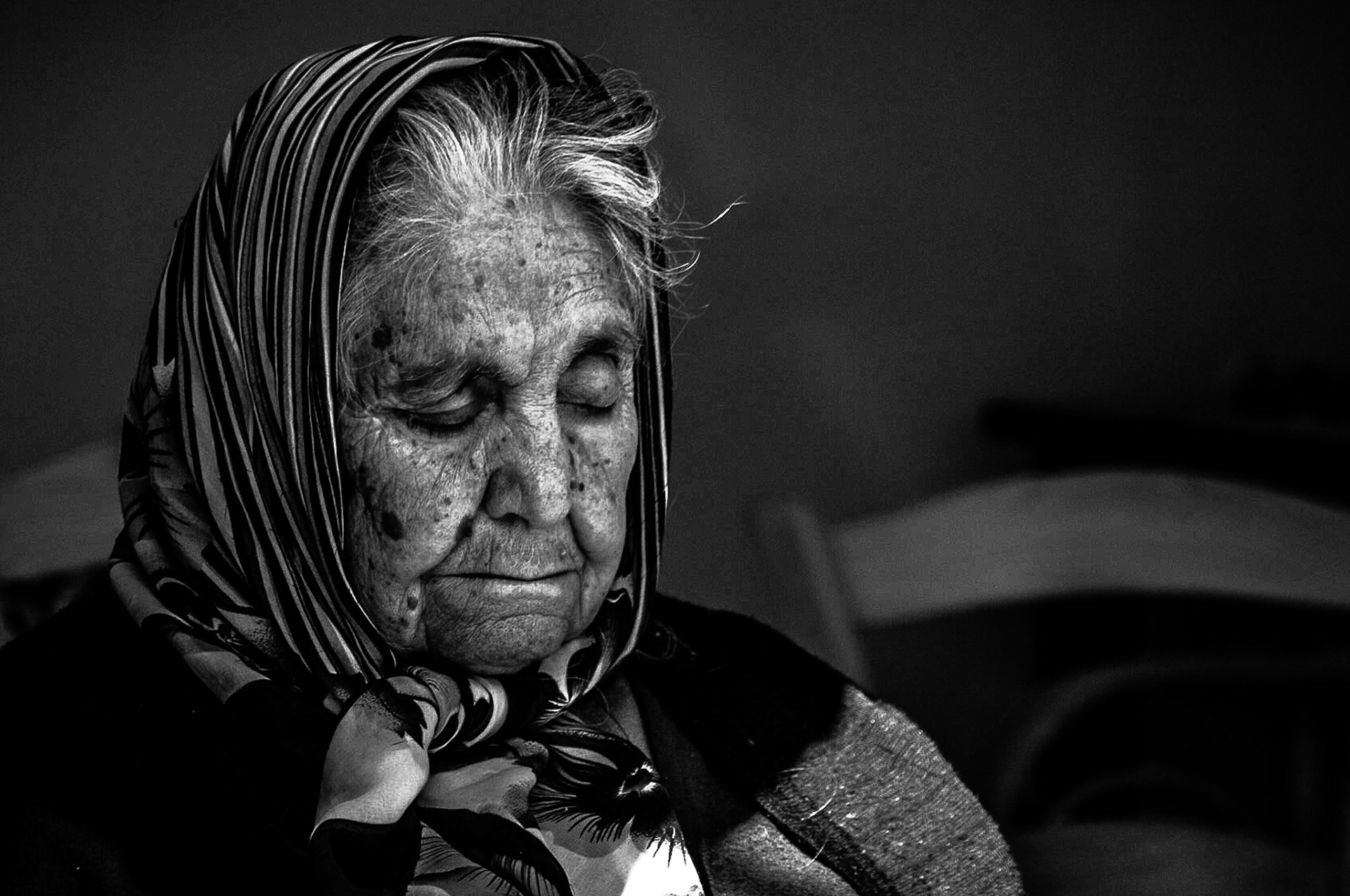 Old lady sleeping in the sun in Occupied Nicosia