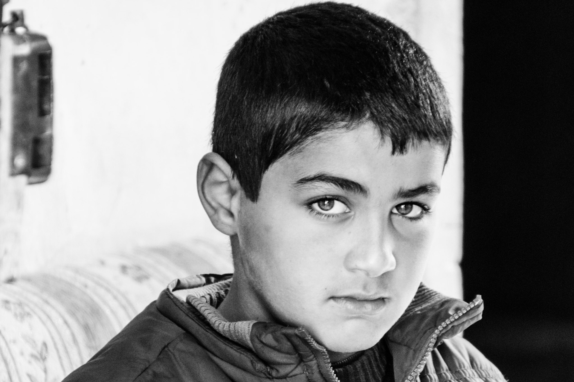 This boy was playing with marbles inside his house in the occupied part of Old Nicosia