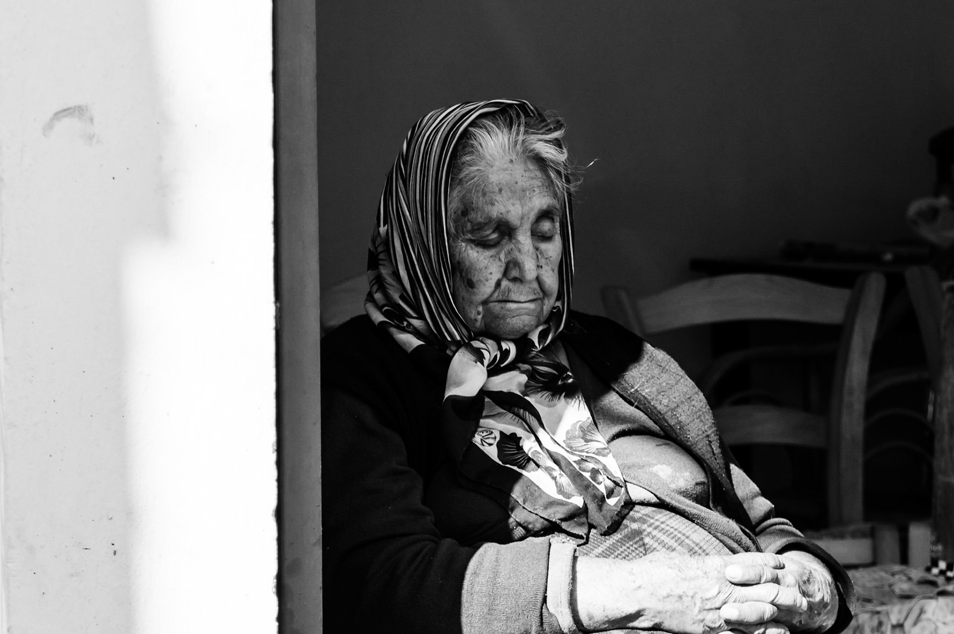 Old lady sleeping in the sun in Occupied Nicosia