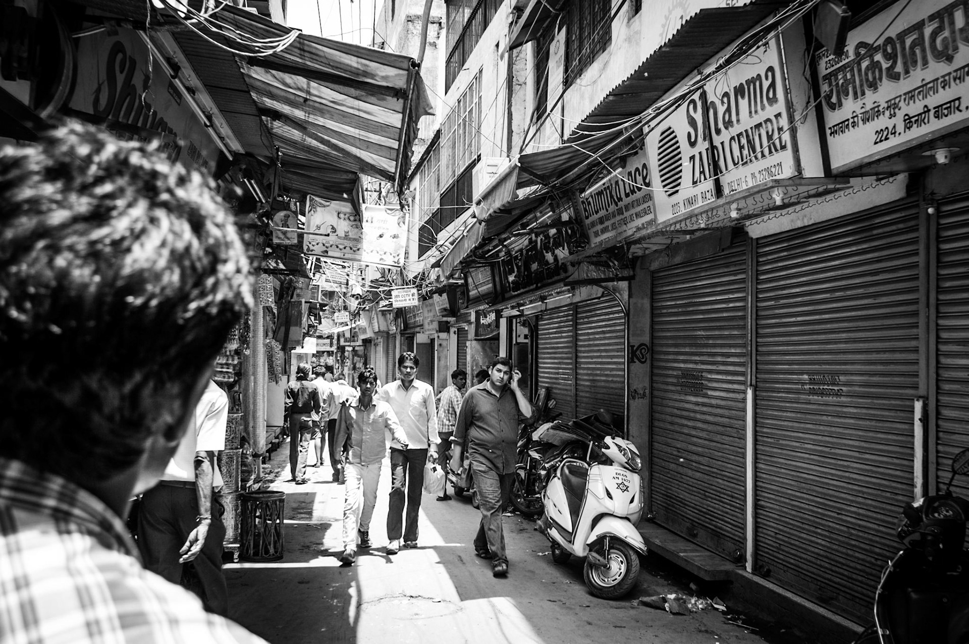 People walking in a street in Old Delhi, India