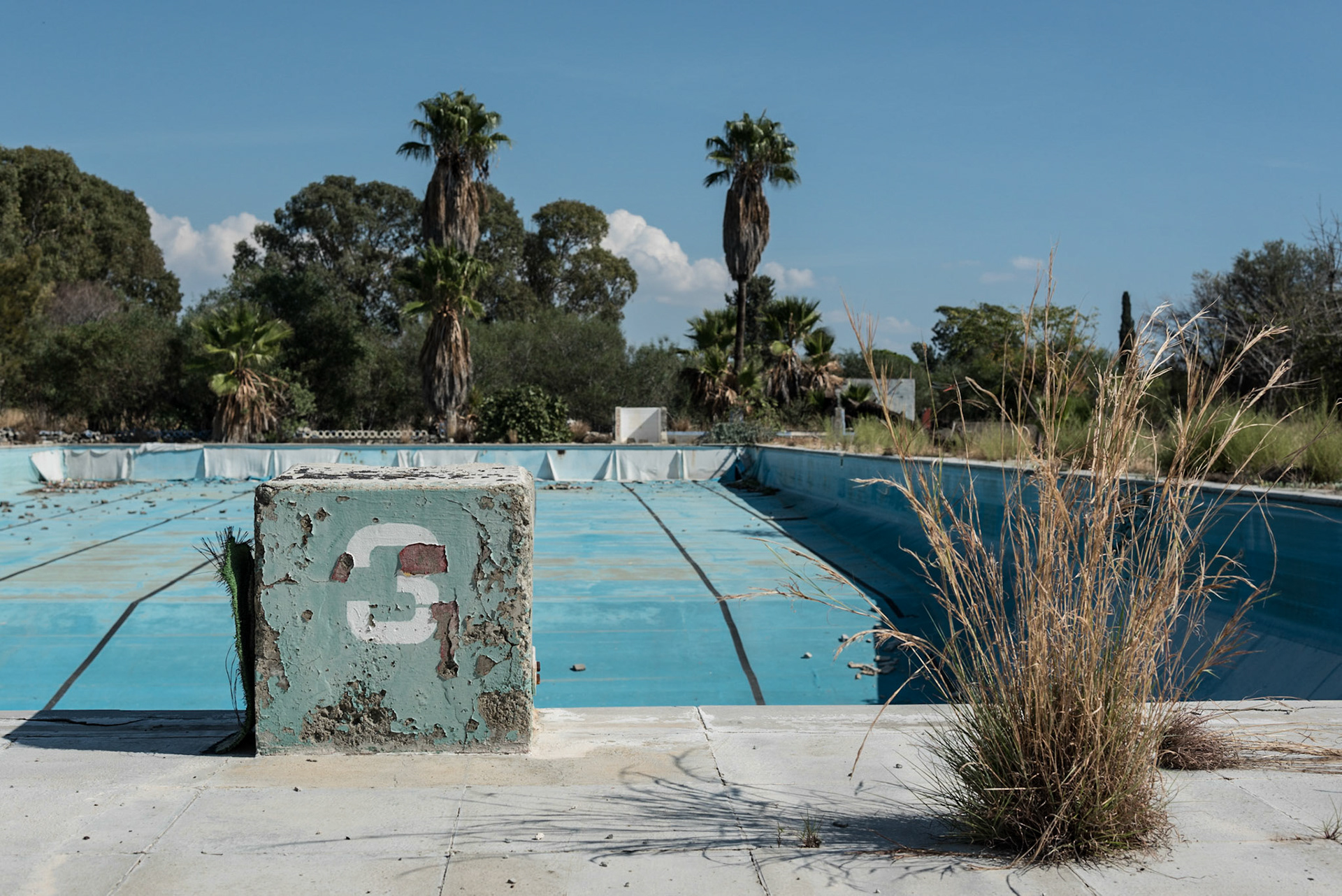 Swimming pool at the abandoned Berengaria Village in Limassol, Cyprus