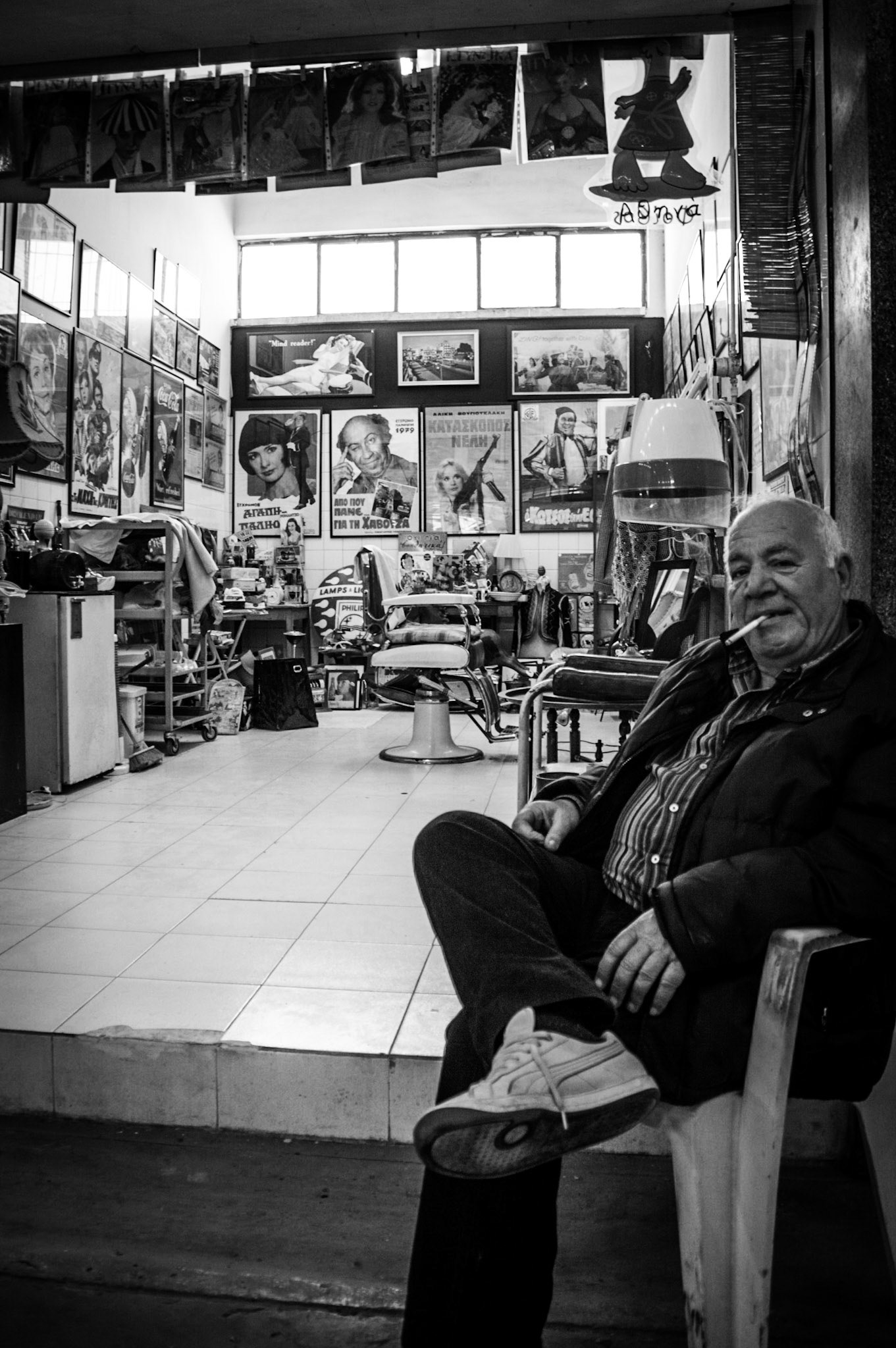 Barben resting outside of his barber shop in Old Nicosia, Cyprus