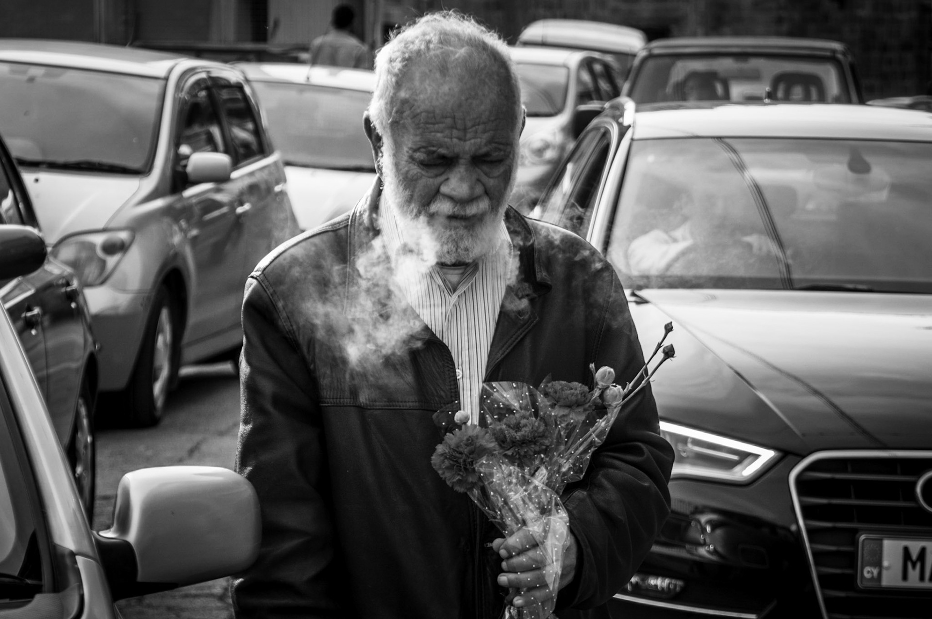 Old man selling carnation flowers  in Old Nicosia, Cyprus