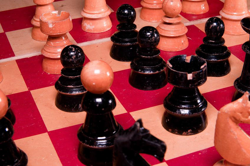 Vintage wooden chess pieces.