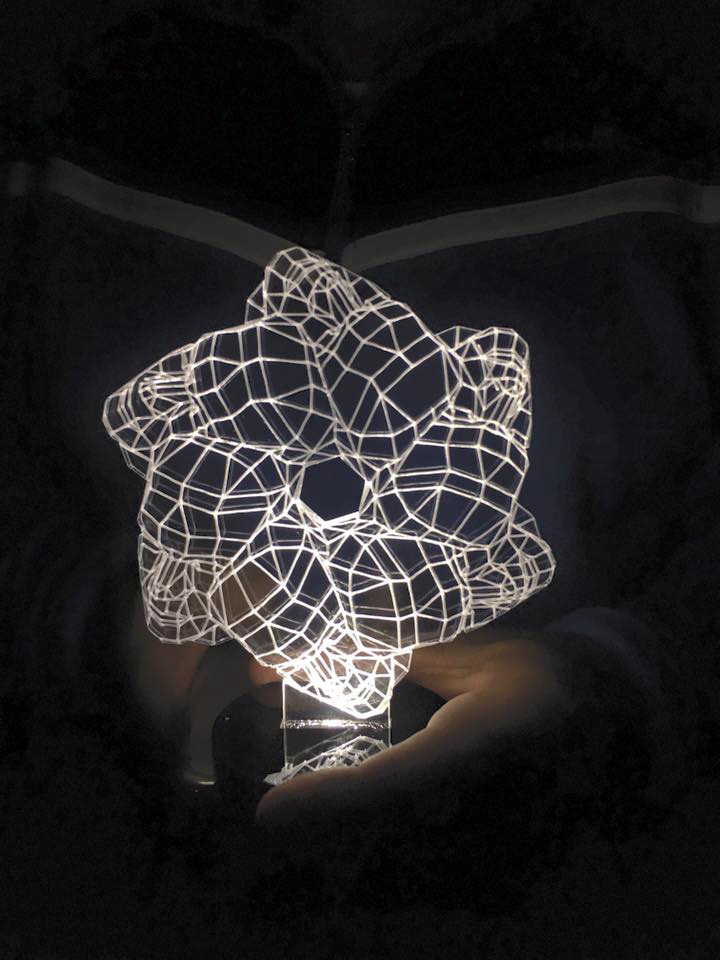 Award design in plexiglass with LED lighting.
