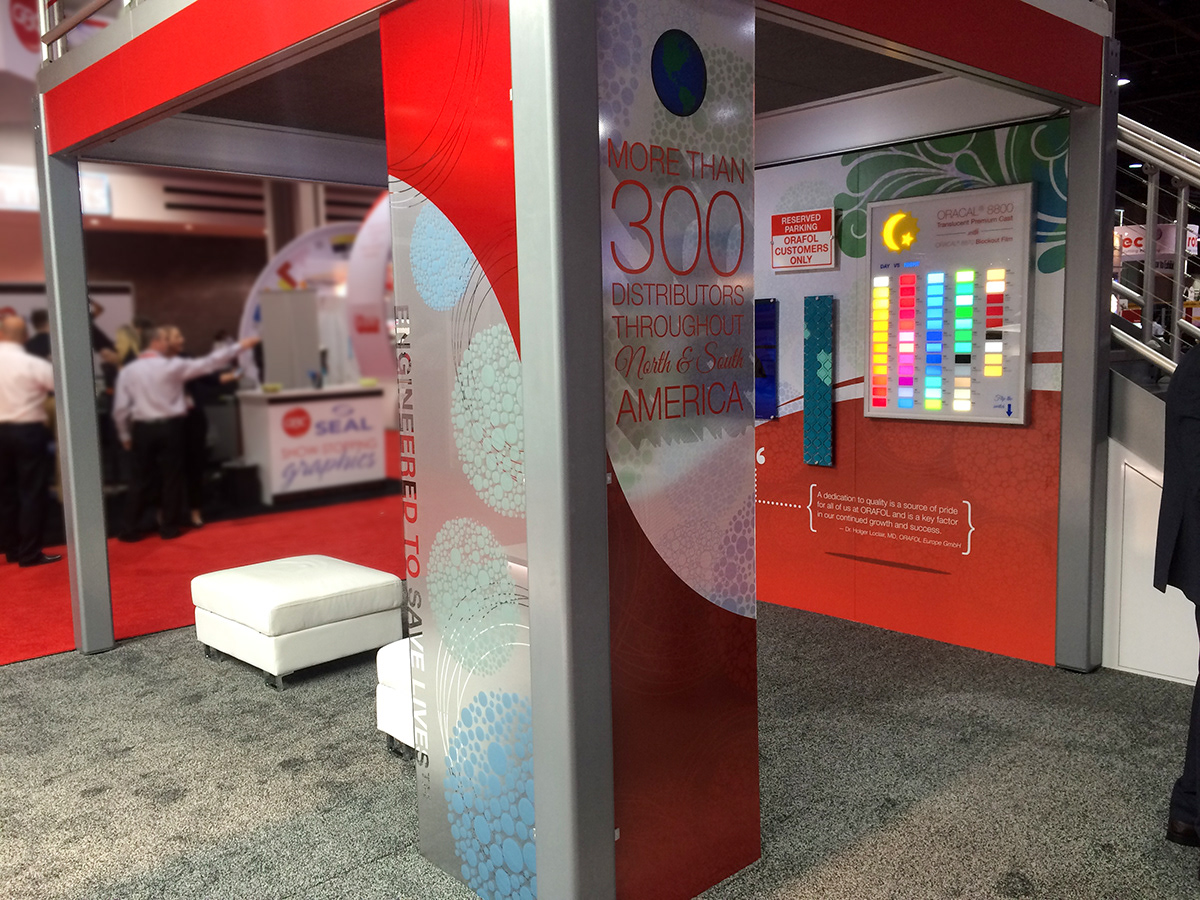 Similar graphics created using ORAJET printed window perf vinyl on one panel, and ORACAL cut vinyls on the adjoining panel.