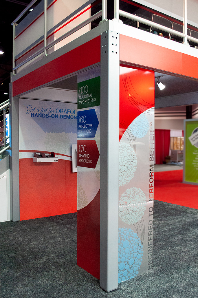 Similar graphics created using ORAJET printed window perf vinyl on one panel, and ORACAL cut vinyls on the adjoining panel.