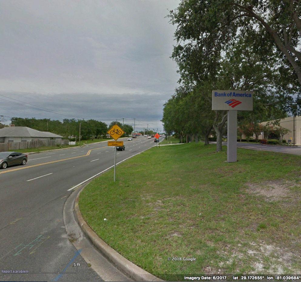 Problem: This shoulder-less segment of south-bound Clyde Morris Blvd effectively cuts off bike/ped access to south-bound transit.