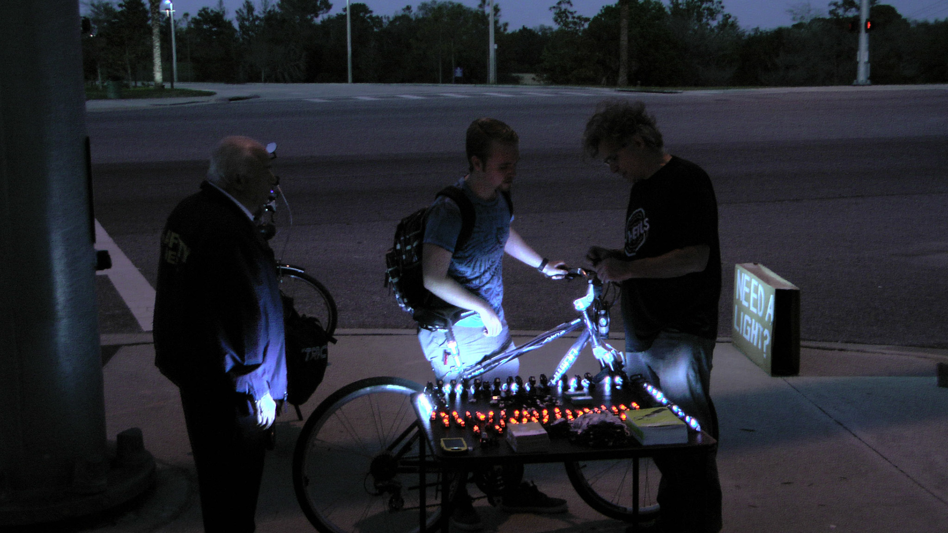 Annual daylight-saving  bike light give way: connecting students on bikes with lights