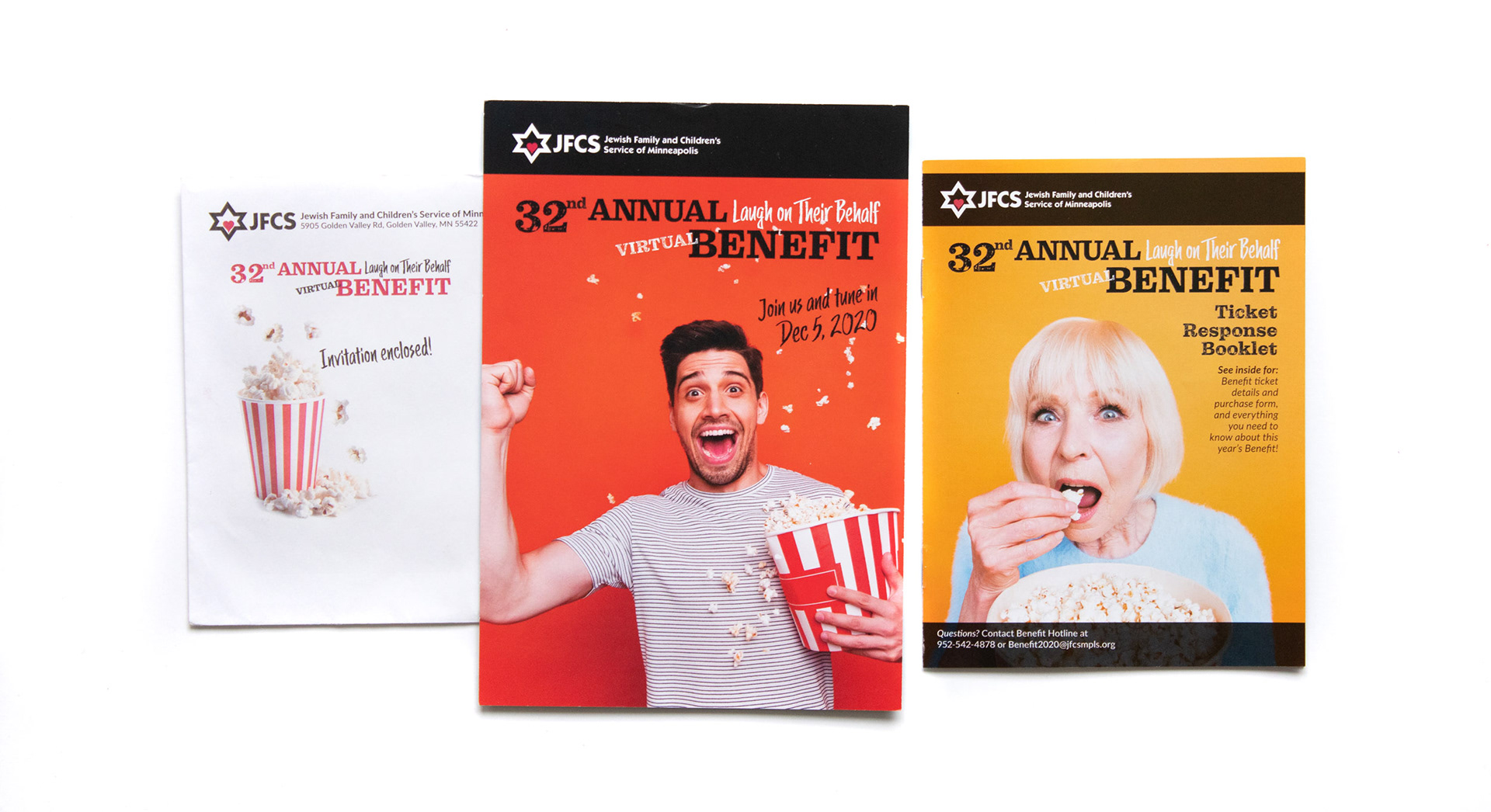 An invitation, envelope and response booklet in bright orange and yellow. People smile with excitement holding big buckets of popcorn and look into the camera.