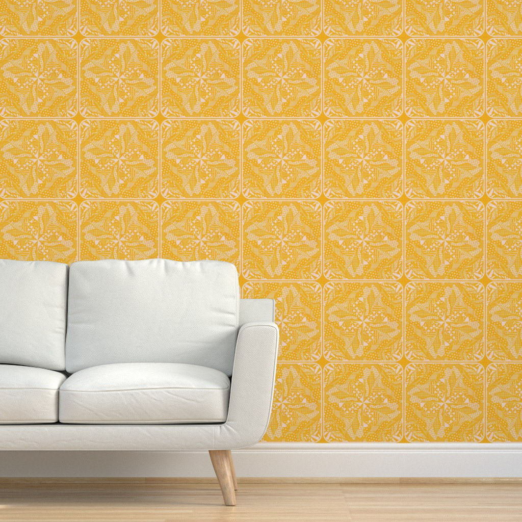 Yellow geometric patterned wallpaper in a mid-century modern style living room setting with a white upholstered sofa and light wood flooring.