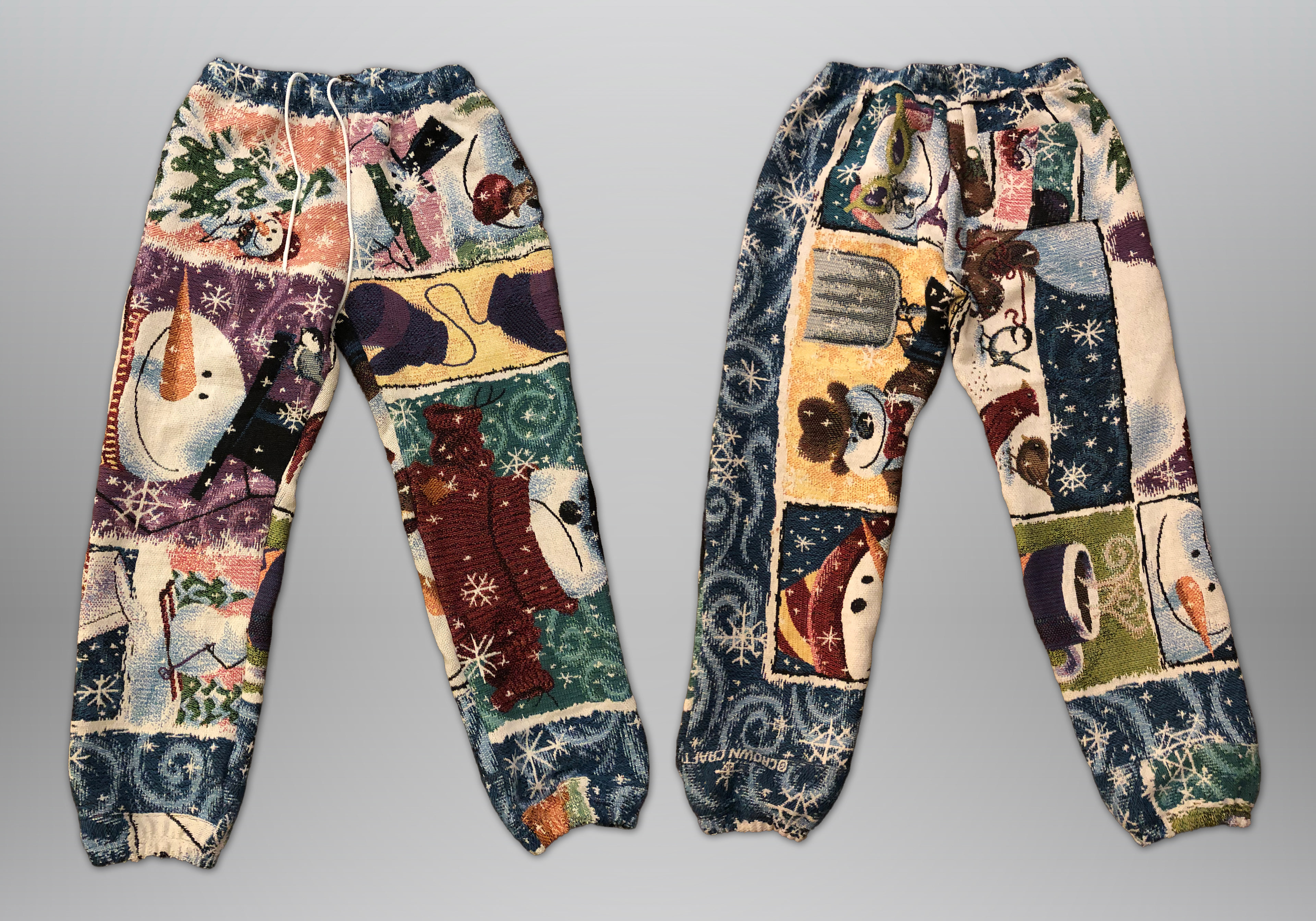 Sewn from holiday knit blanket. Features elastic waistband, drawstring, 2 deep side hem pockets, and one back pocket.