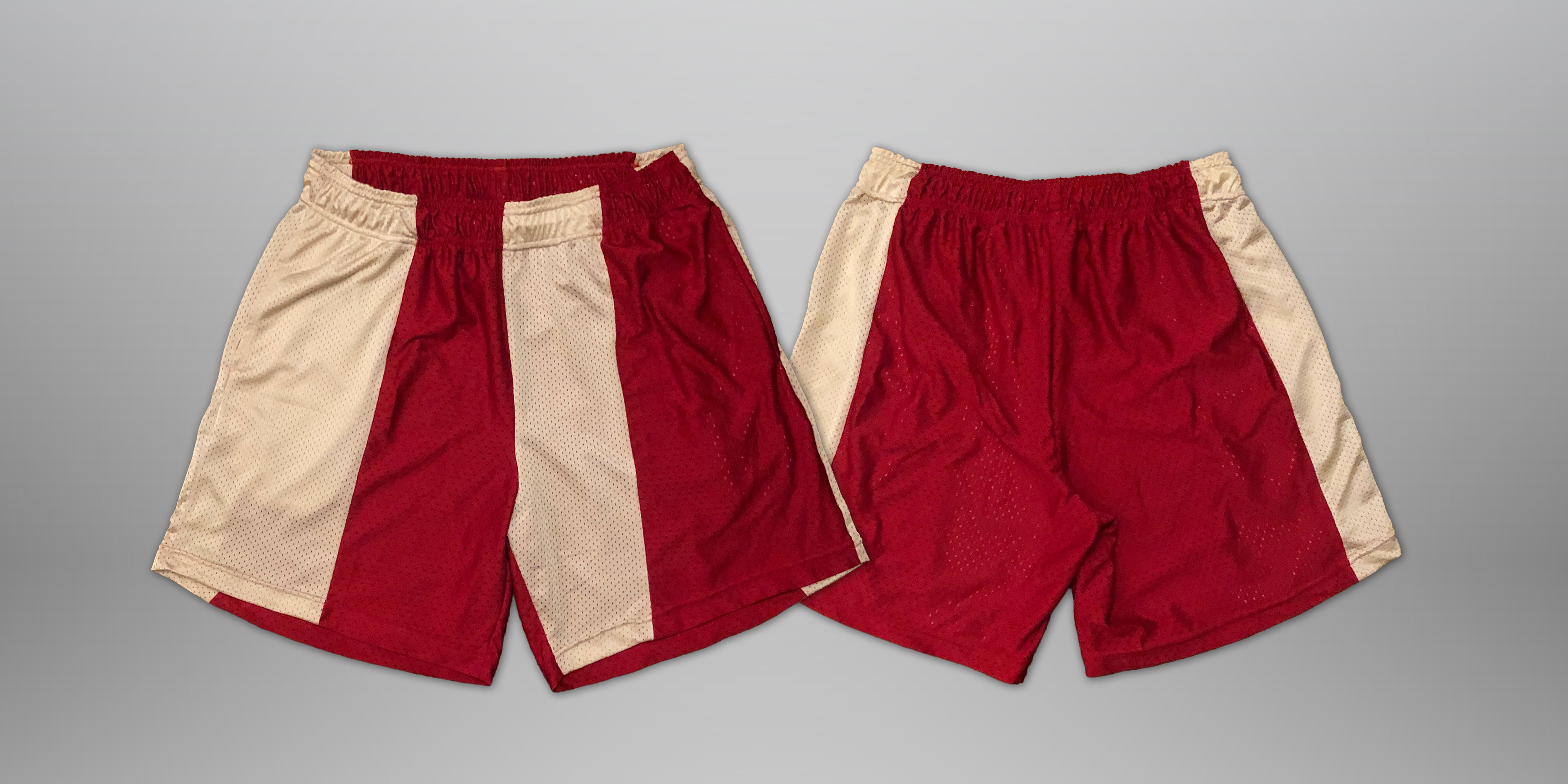 Sewn from jersey scraps. Features elastic waistband, drawstring, and 2 deep side hem pockets. Slightly cropped fit (above the knee).