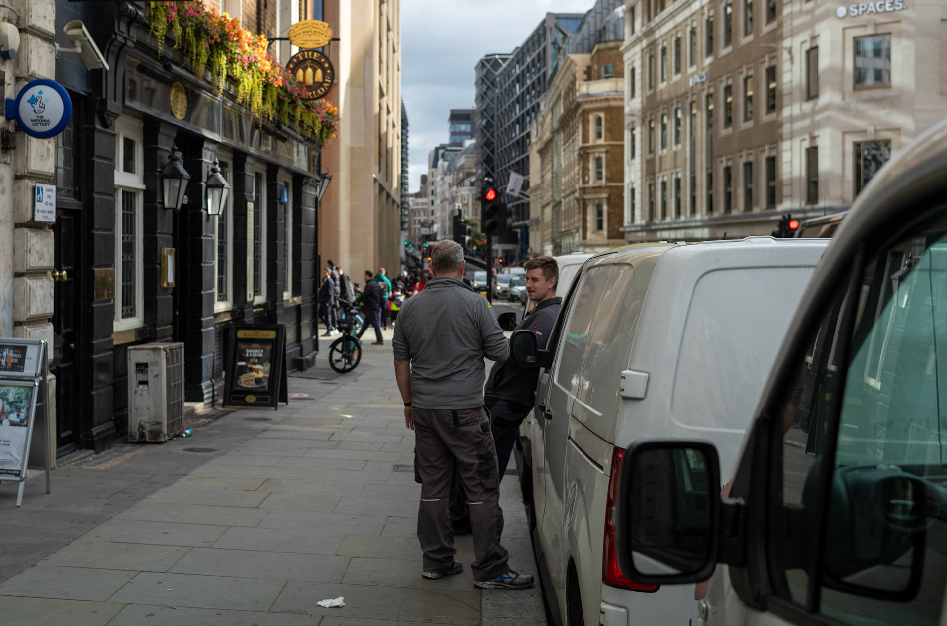 Two Men Talking on the Street