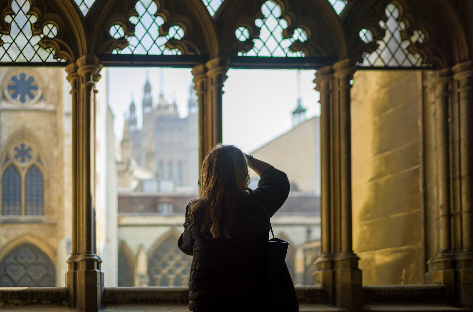 A Woman Takes Photos in Westminster Abby