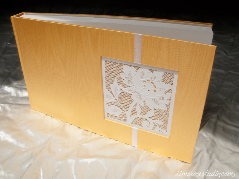 I just love this gold moiré! I ended up with enough extra materials to make almost an exact duplicate of this book... those papers are still sitting at the bottom of a drawer untouched.