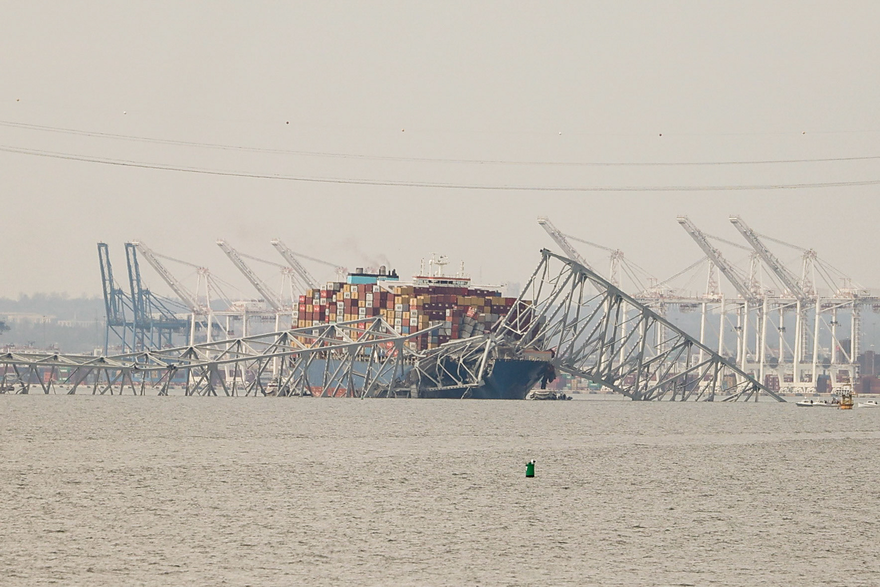 March 26, 2024, Francis Scott Key Bridge, Baltimore, Maryland, USA. The Francis Scott Key Bridge was hit by an international cargo ship and collapsed.  tragedy in Baltimore, an international ship hits the Key Bridge. Cars fall off into the water and workers were thrown off as well. There is a search and rescue happening now. The port of Baltimore is greatly impacted.  Photo Credit: Robyn Stevens Brody/Sipa USA.