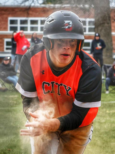 April 4, 2022, Baltimore City College, Baltimore, Maryland, Baltimore City College Varsity Baseball Captain, Leo Brody '22, steals second base. The City Knights were victorius over Western Tech, 5-3.