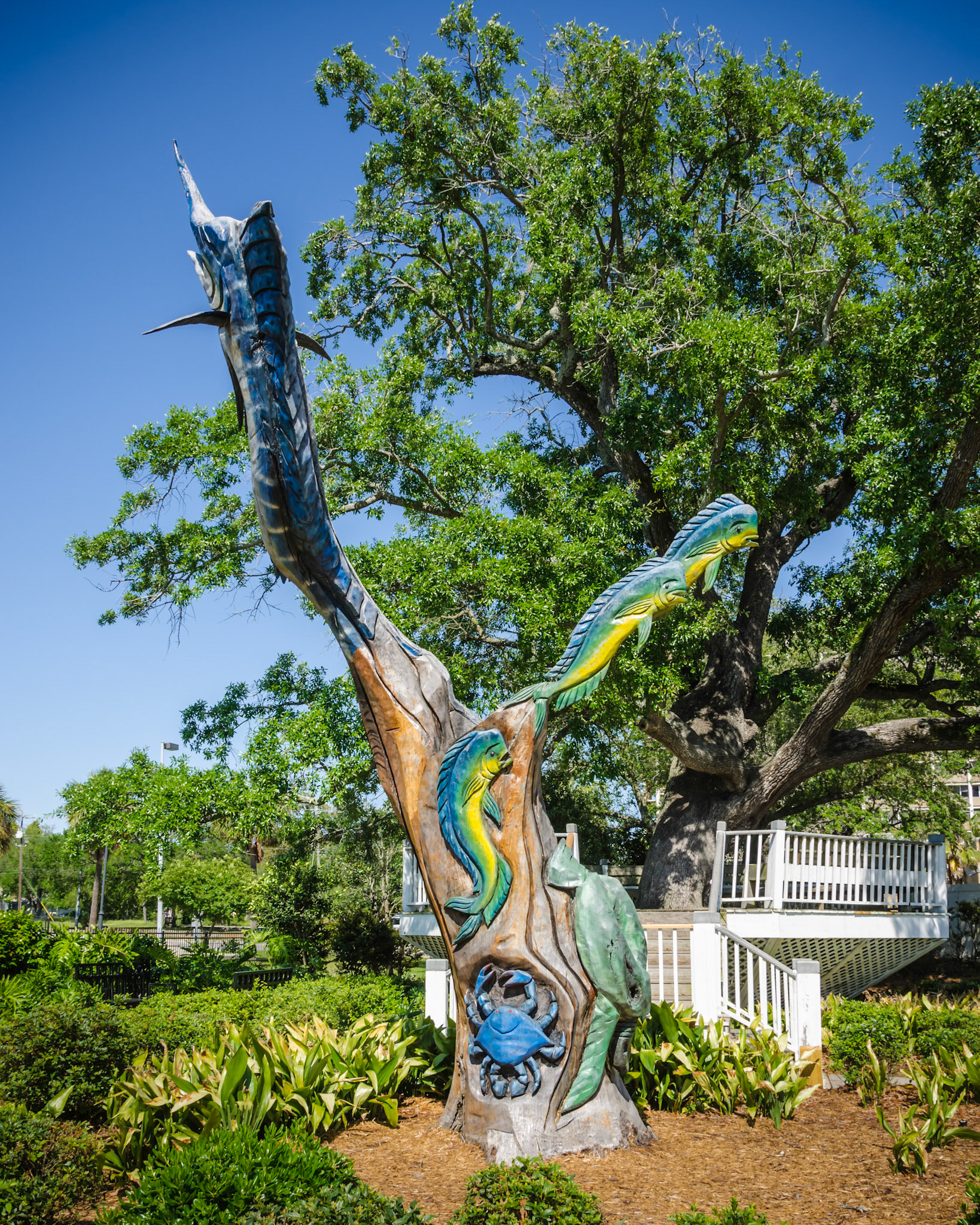 A 24-foot sculpture by wood carver Marlin Miller. Located by the Hurricane Katrina Memorial on the  Biloxi Town Green, Mississippi.