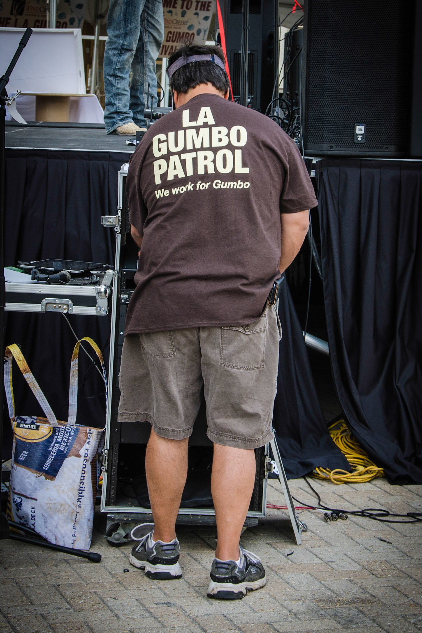 Worker at the Gumbo Festival held at the Wharf.